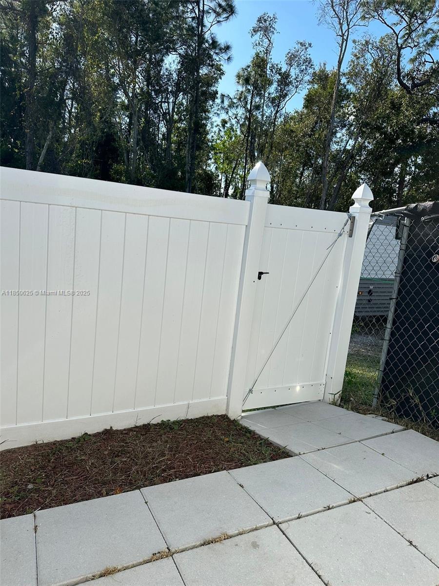 442 Conlee Street Lehigh Acres, FL 33974 - Photo 45 of 79 a view of a utility room