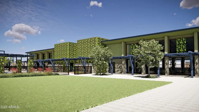 a front view of building with yard