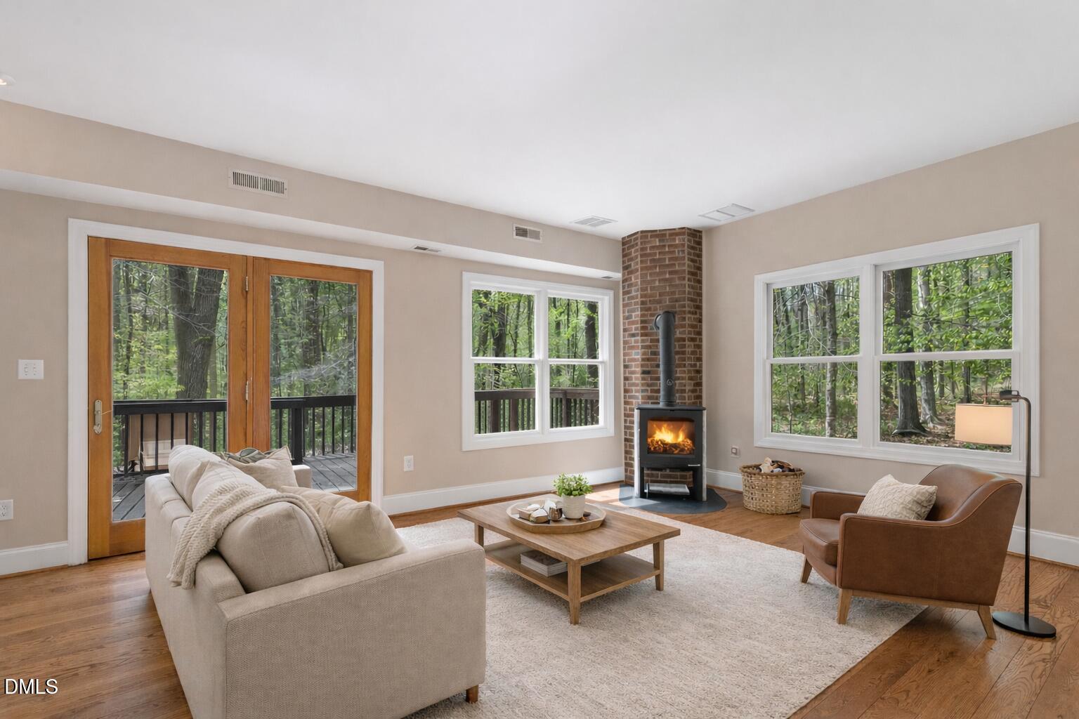 4524 Ridge Trail Efland, NC 27243 - Photo 14 of 48 a living room with furniture and floor to ceiling windows