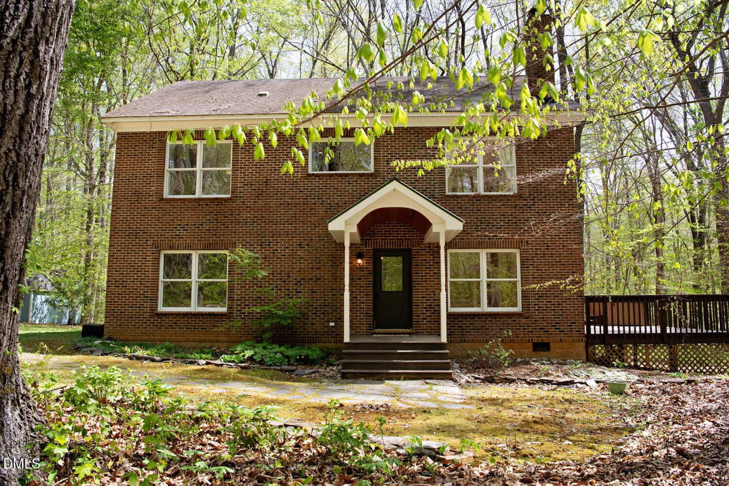 4524 Ridge Trail Efland, NC 27243 - Photo 2 of 48 a front view of a house with a yard