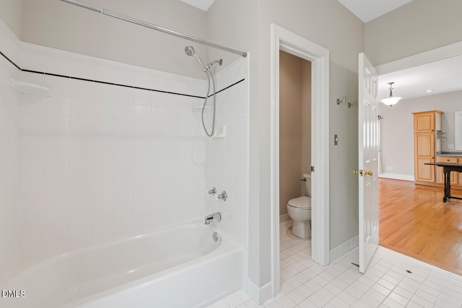 4524 Ridge Trail Efland, NC 27243 - Photo 35 of 48 a bathroom with a bathtub and a shower