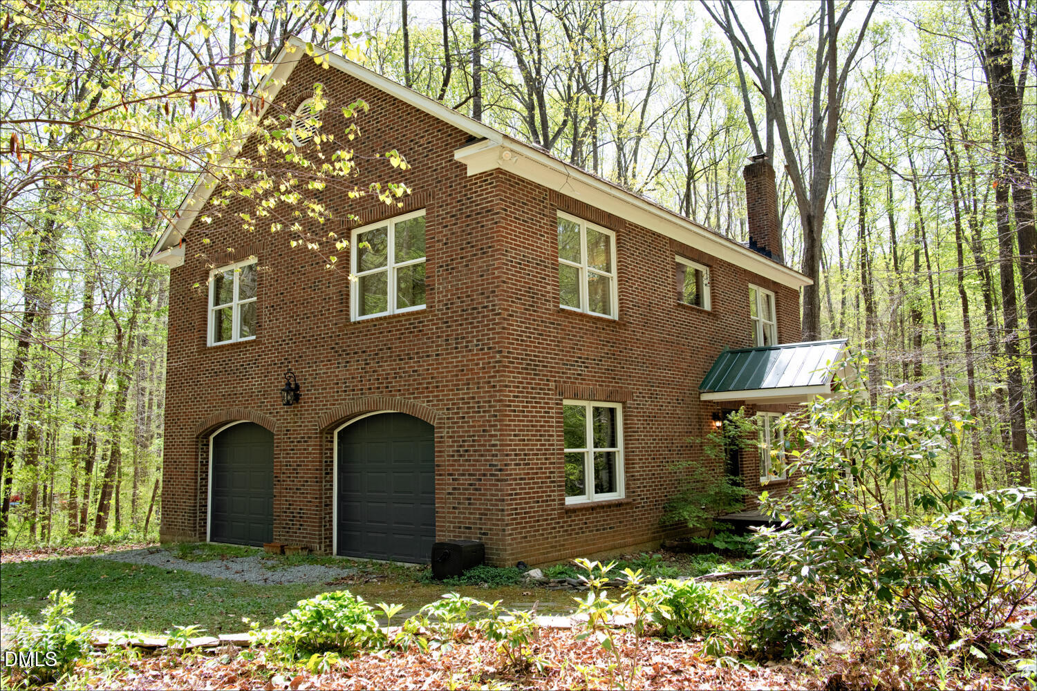 4524 Ridge Trail Efland, NC 27243 - Photo 4 of 48 a front view of a house with a yard and garage
