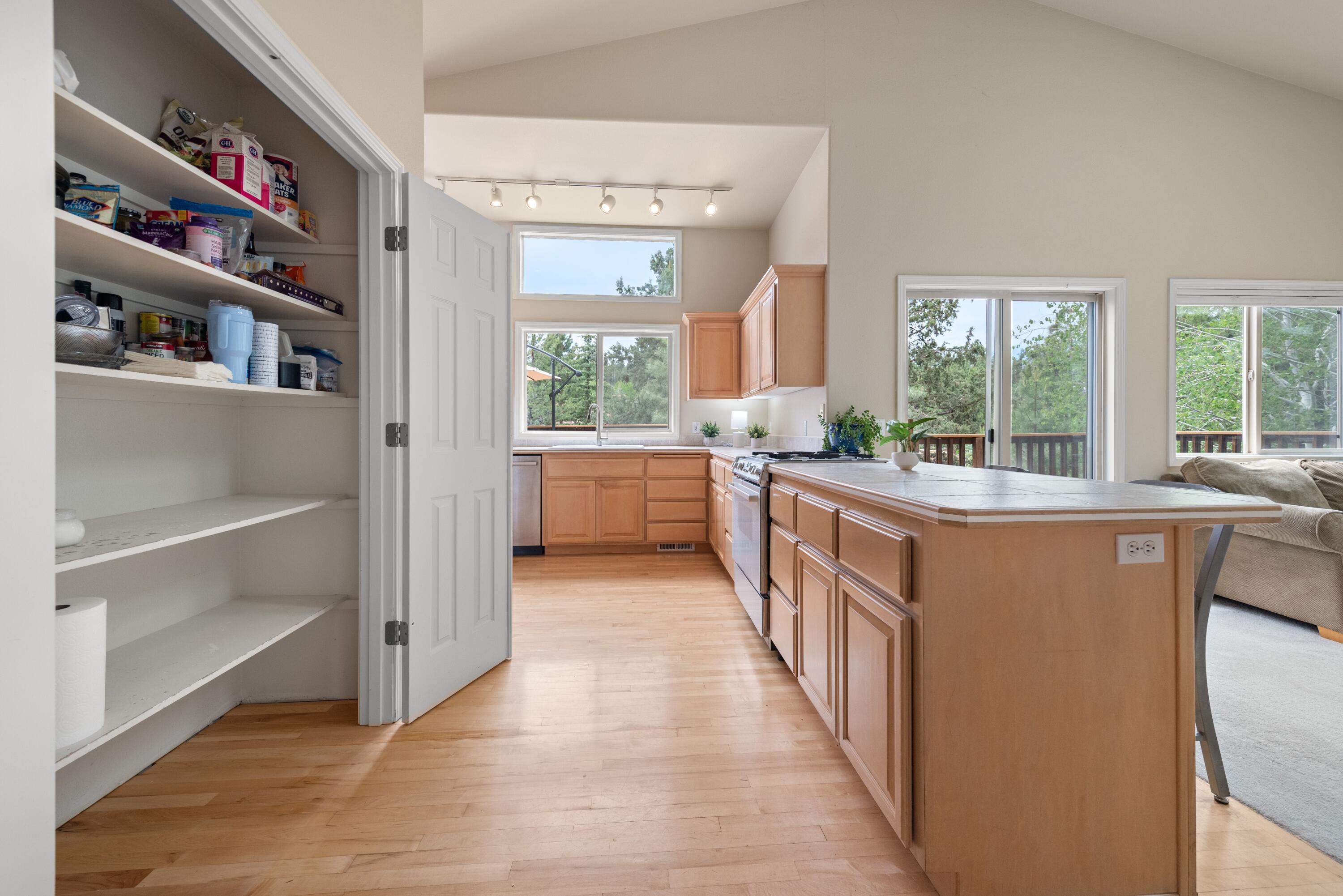 2255 Northwest Putnam Road Bend, OR 97703 - Photo 16 of 49 A big pantry and lots of cabinetry provide lots of storage.
