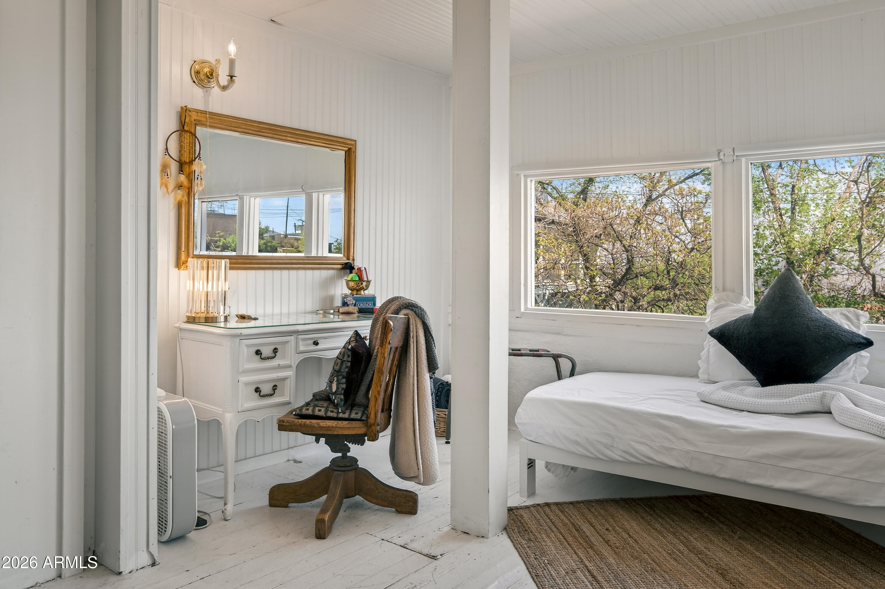 511 Main Street Jerome, AZ 86331 - Photo 13 of 67 a bedroom with a bed and wooden floor