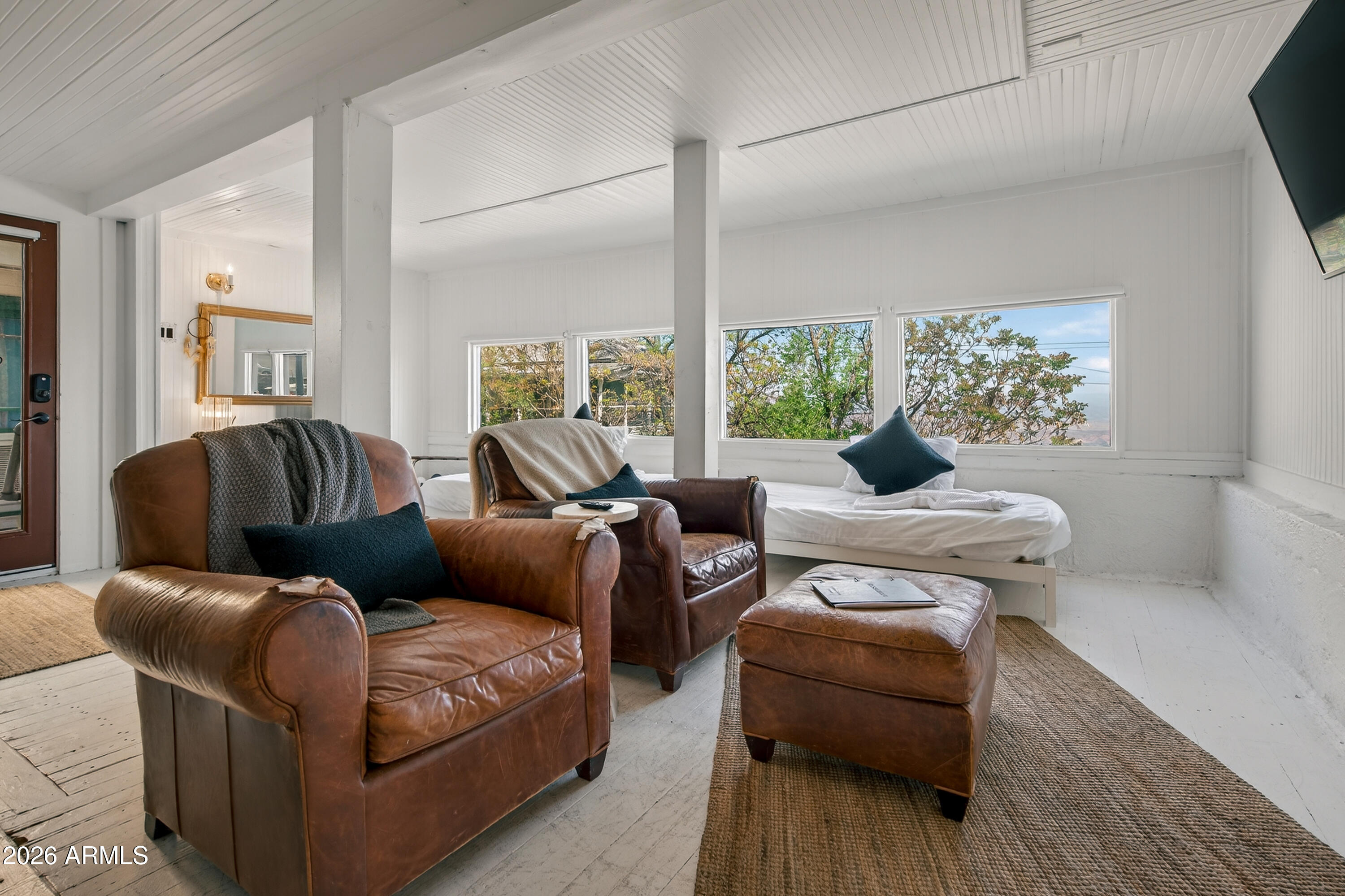 511 Main Street Jerome, AZ 86331 - Photo 20 of 67 a living room with furniture and a large window