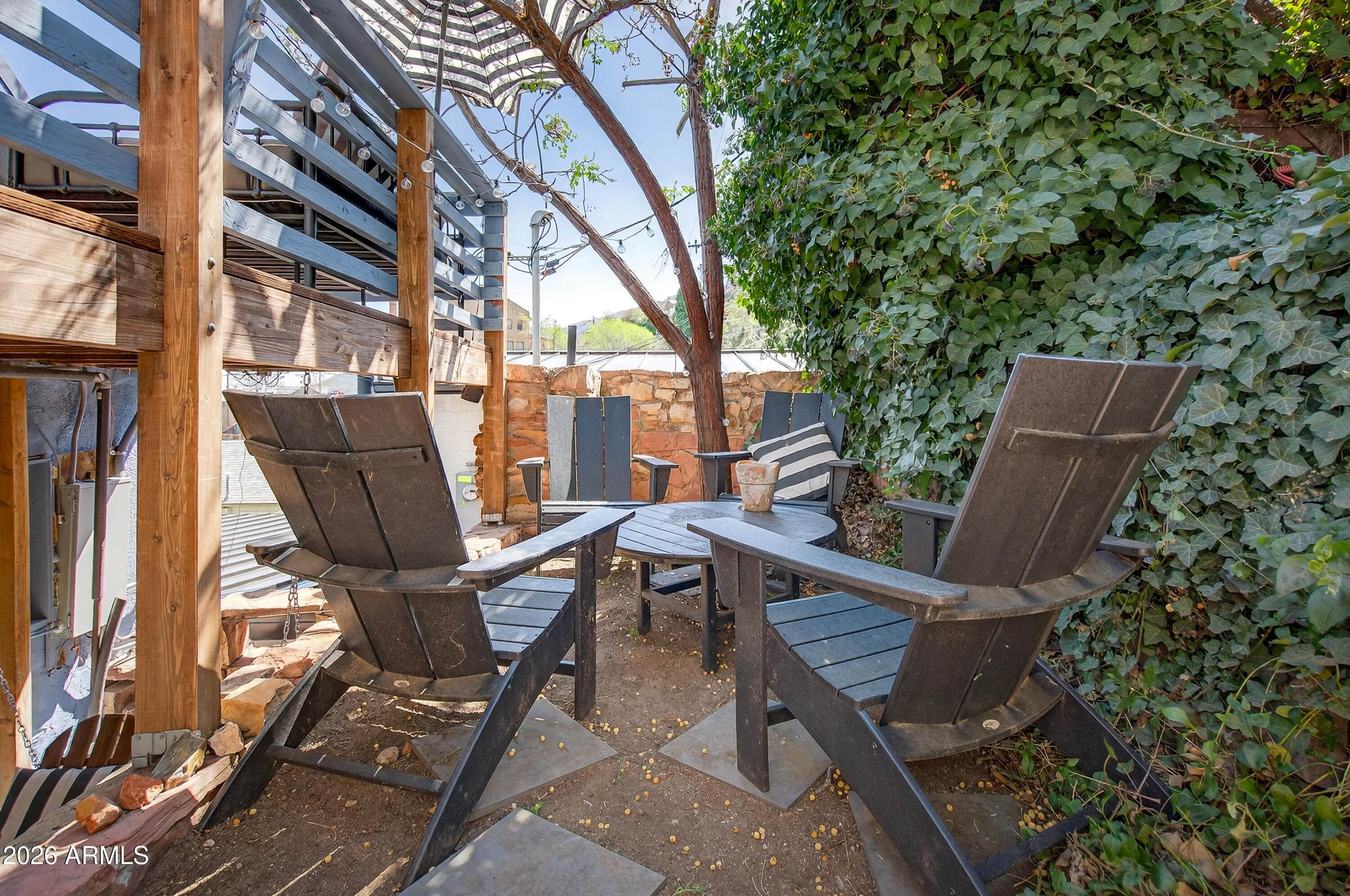 511 Main Street Jerome, AZ 86331 - Photo 28 of 67 a view of balcony with a table and chairs
