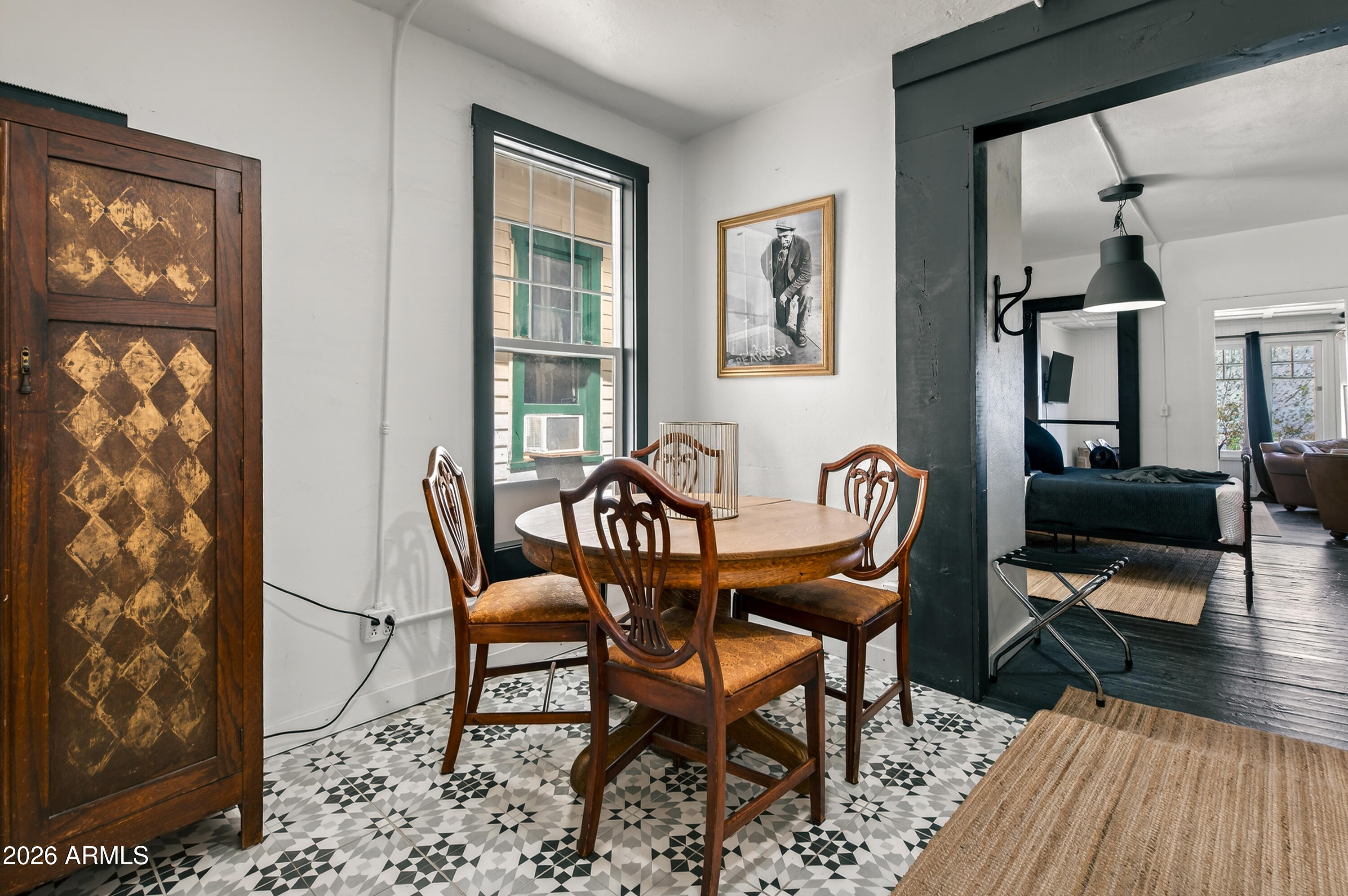 511 Main Street Jerome, AZ 86331 - Photo 30 of 67 a dining room with furniture and wooden floor