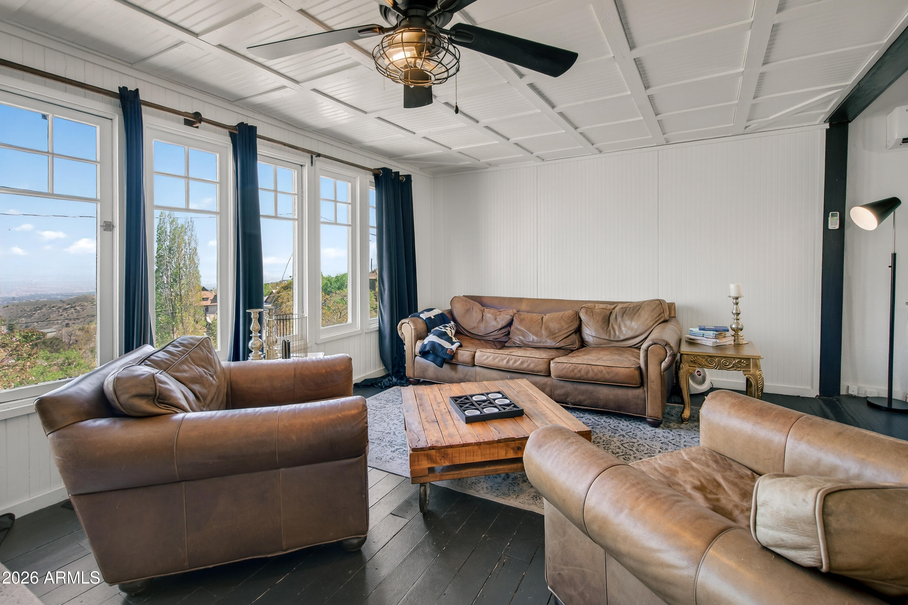 511 Main Street Jerome, AZ 86331 - Photo 31 of 67 a living room with furniture and a large window