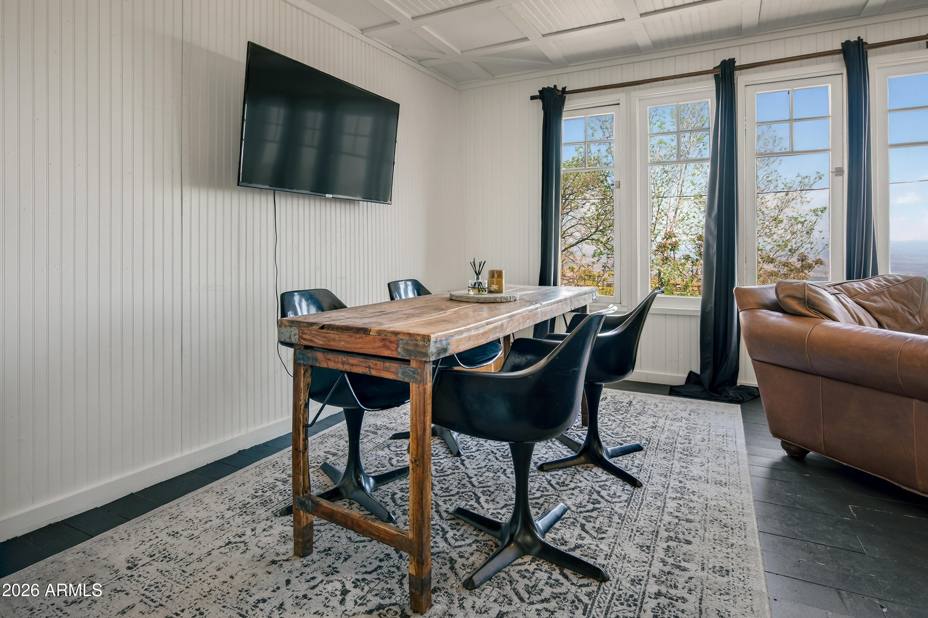 511 Main Street Jerome, AZ 86331 - Photo 34 of 67 a living room with furniture and a flat screen tv
