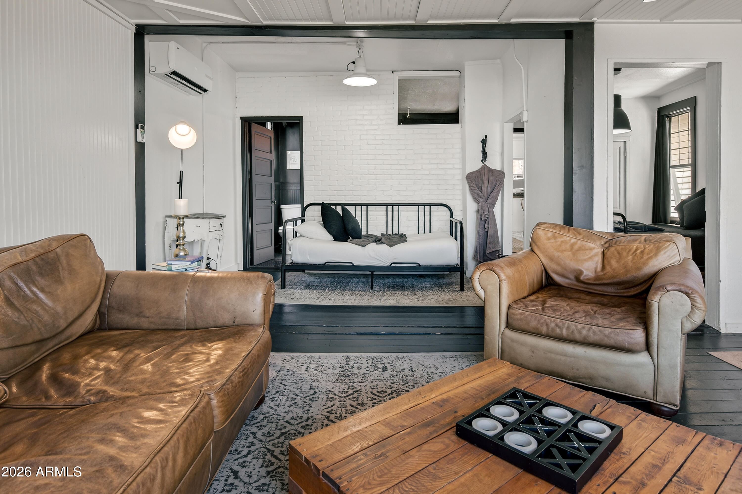 511 Main Street Jerome, AZ 86331 - Photo 35 of 67 a living room with furniture and a wooden floor