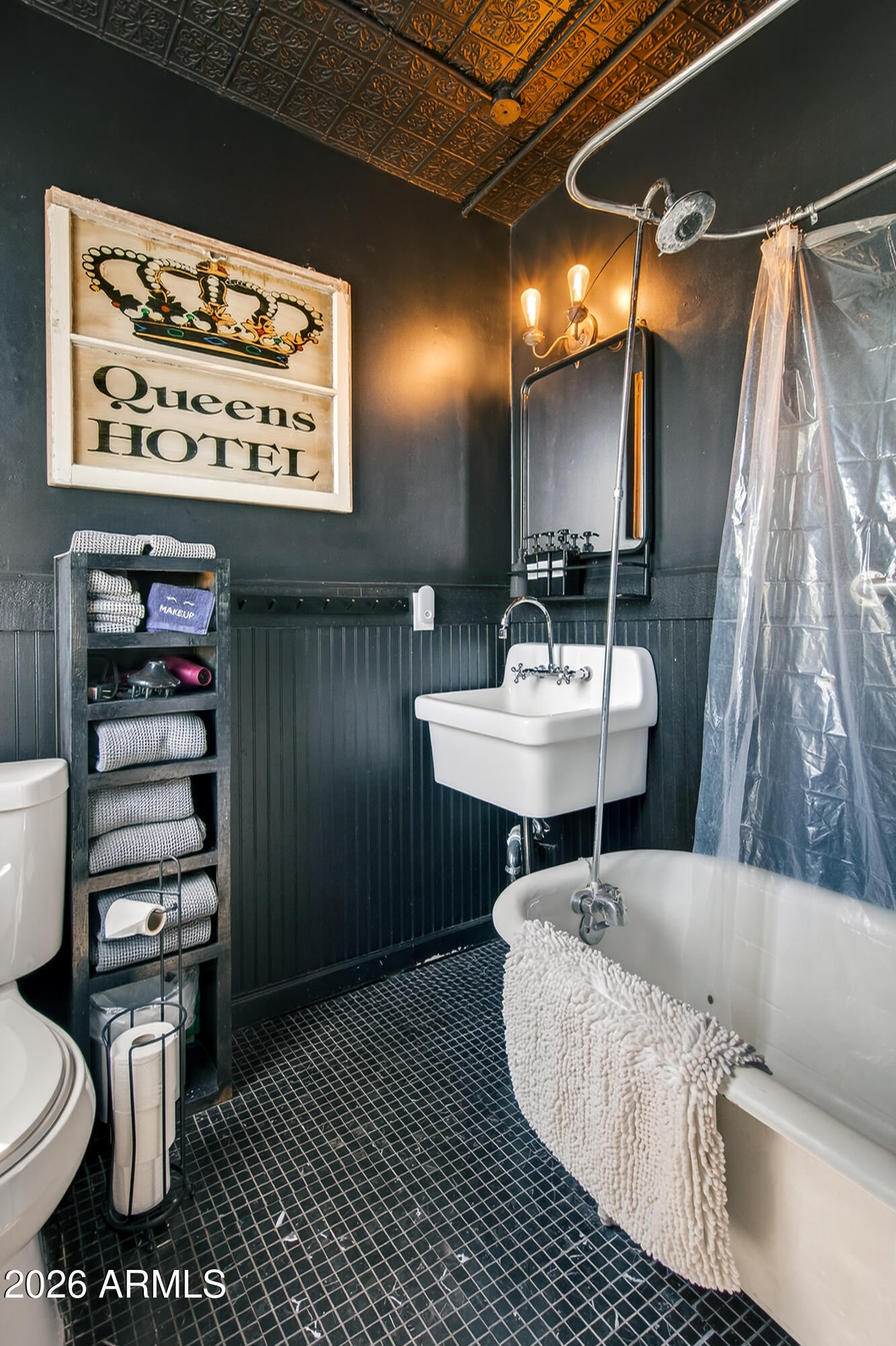 511 Main Street Jerome, AZ 86331 - Photo 38 of 67 a bathroom with a sink toilet and a mirror