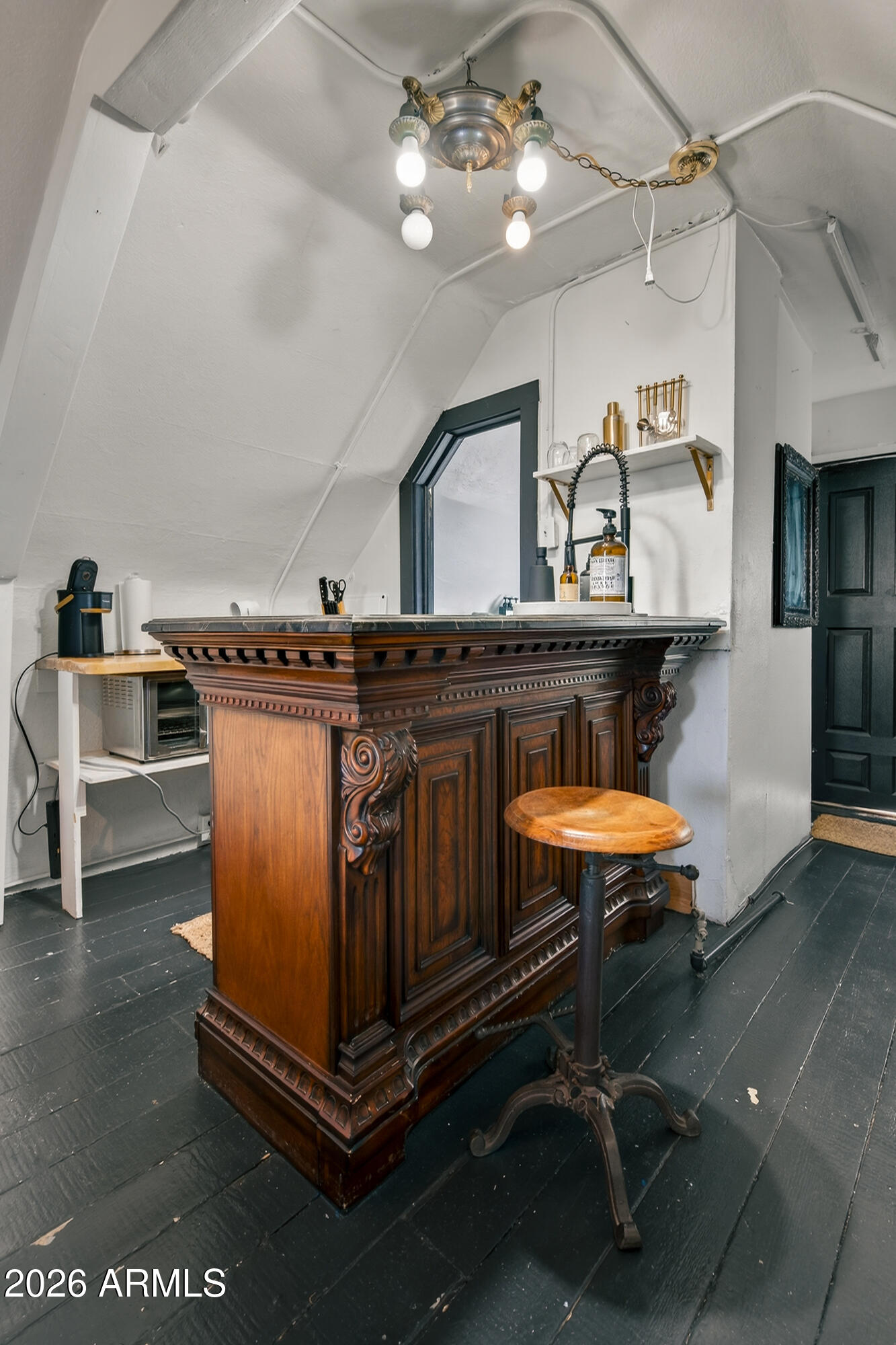 511 Main Street Jerome, AZ 86331 - Photo 52 of 67 a kitchen with stainless steel appliances granite countertop a sink a stove and a refrigerator