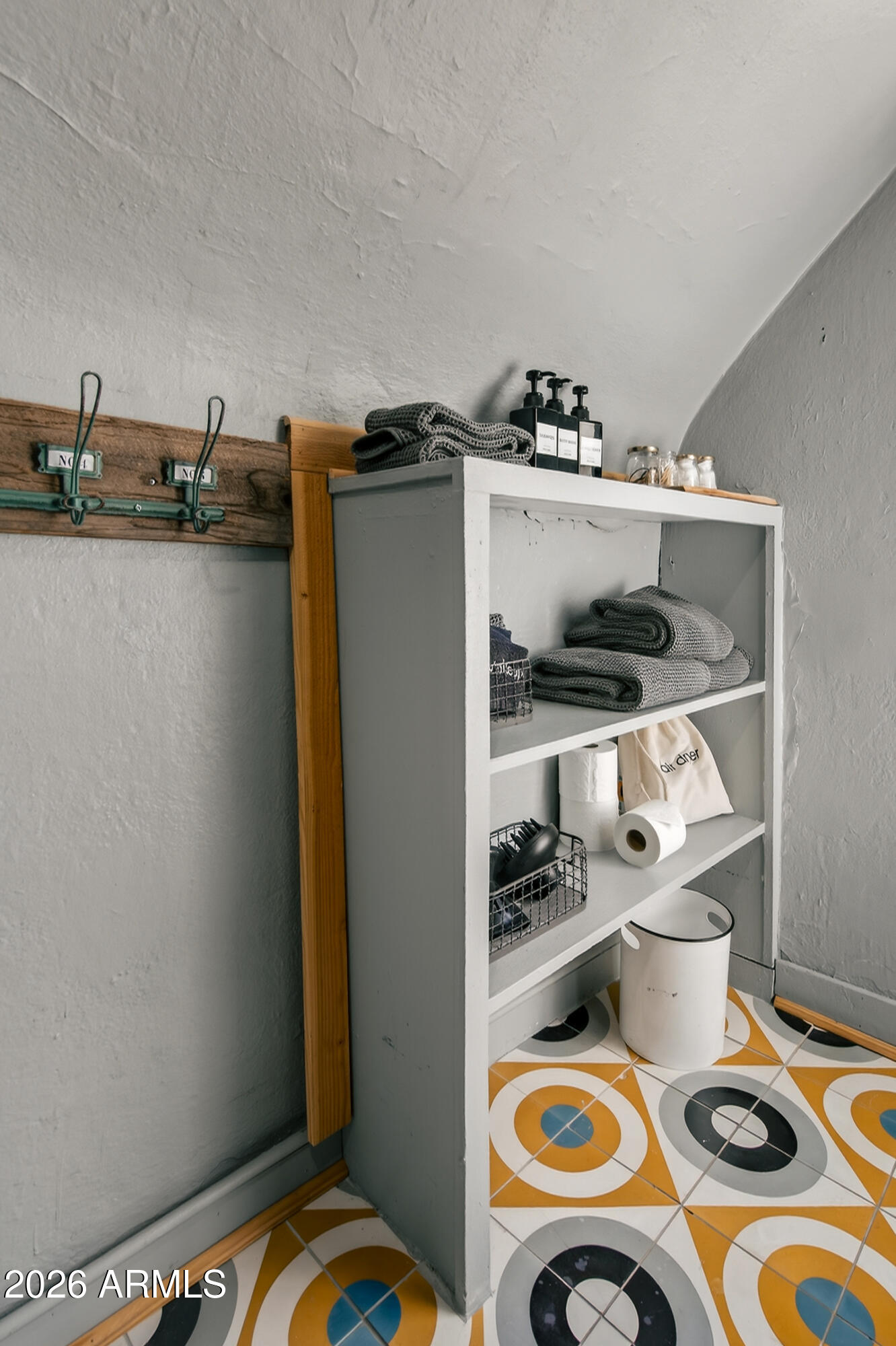 511 Main Street Jerome, AZ 86331 - Photo 57 of 67 a view of walk in closet with clothes and shoes