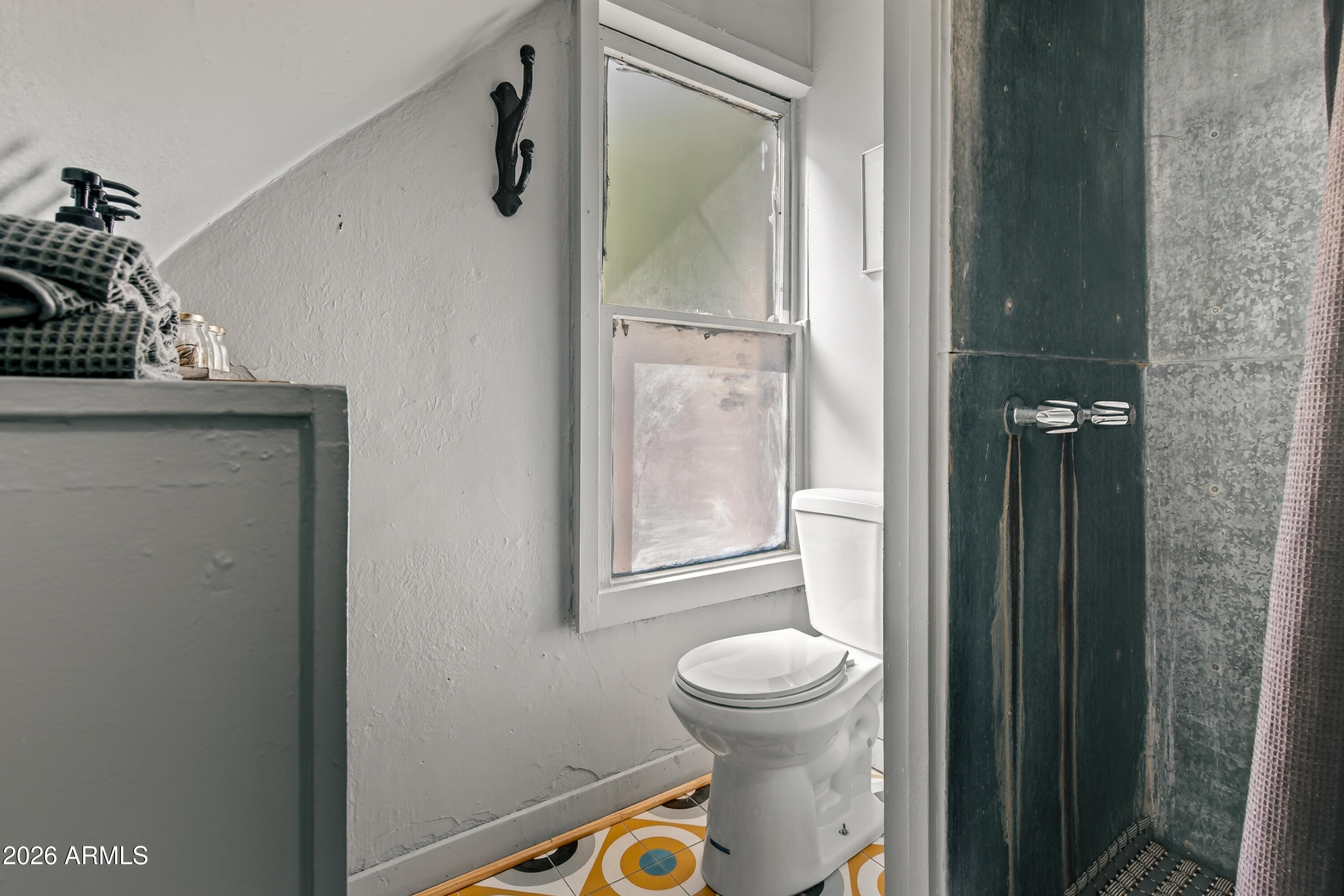 511 Main Street Jerome, AZ 86331 - Photo 58 of 67 a bathroom with a toilet and a shower