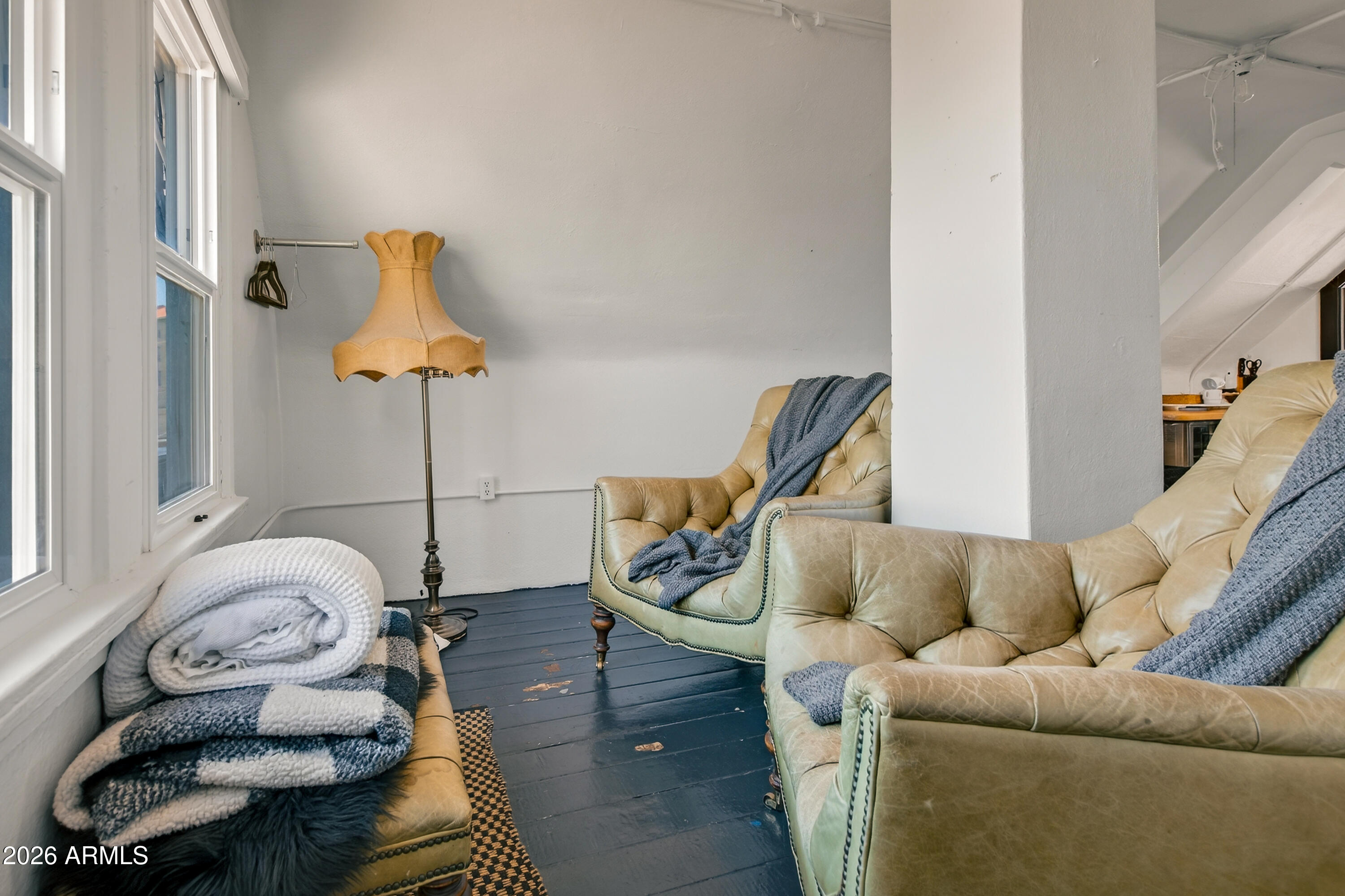 511 Main Street Jerome, AZ 86331 - Photo 61 of 67 a living room with furniture chess board and a ceiling fan