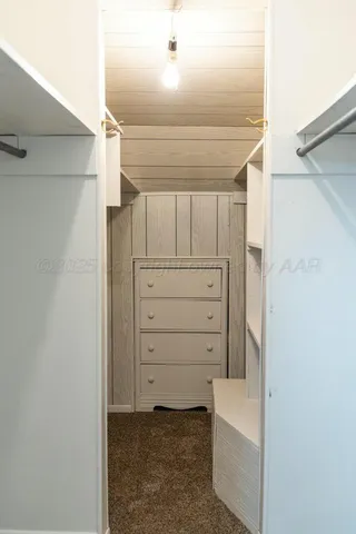 an empty room with closet