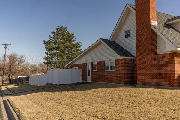 a view of backyard of house
