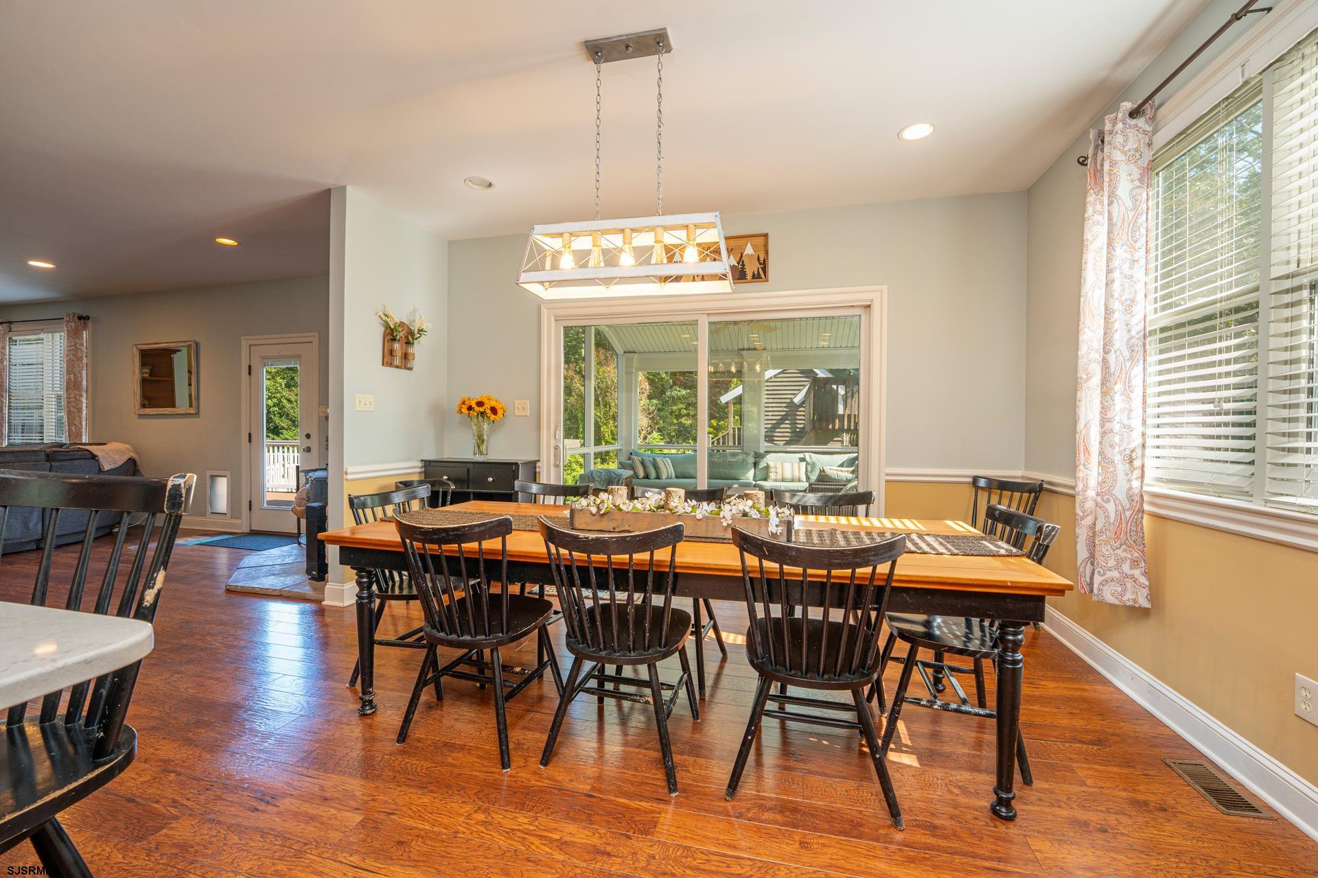 103 Tyler Road Ocean View, NJ 08230 - Photo 49 of 80 a view of a dining room with furniture window and wooden floor