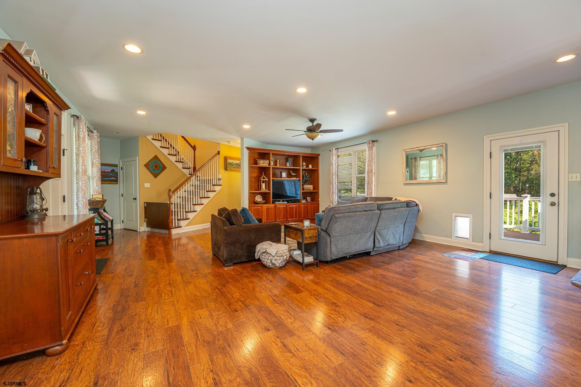 103 Tyler Road Ocean View, NJ 08230 - Photo 50 of 80 a living room with furniture and a wooden floor