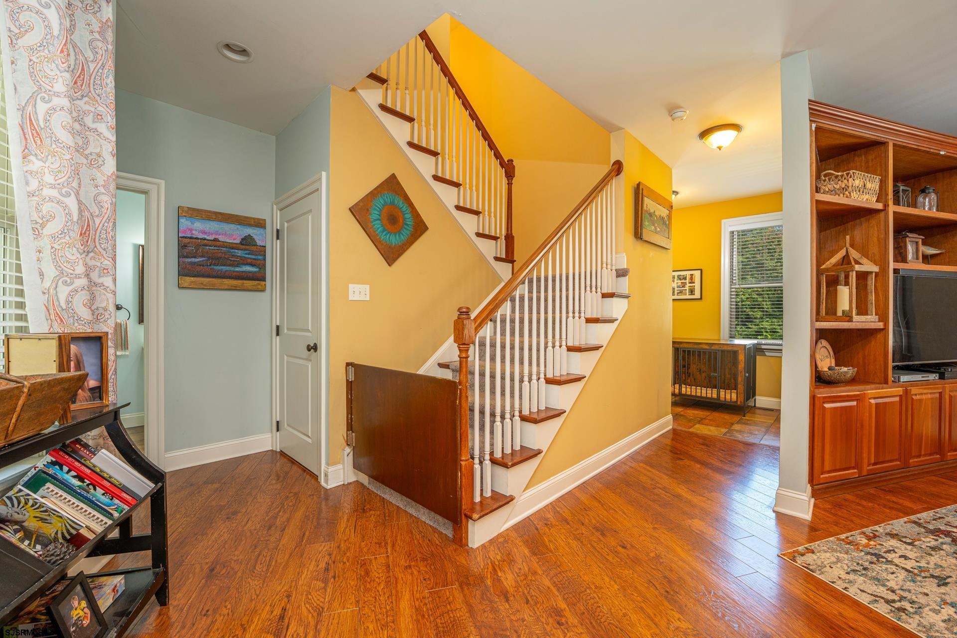 103 Tyler Road Ocean View, NJ 08230 - Photo 52 of 80 a view of an entryway with wooden floor and stairs