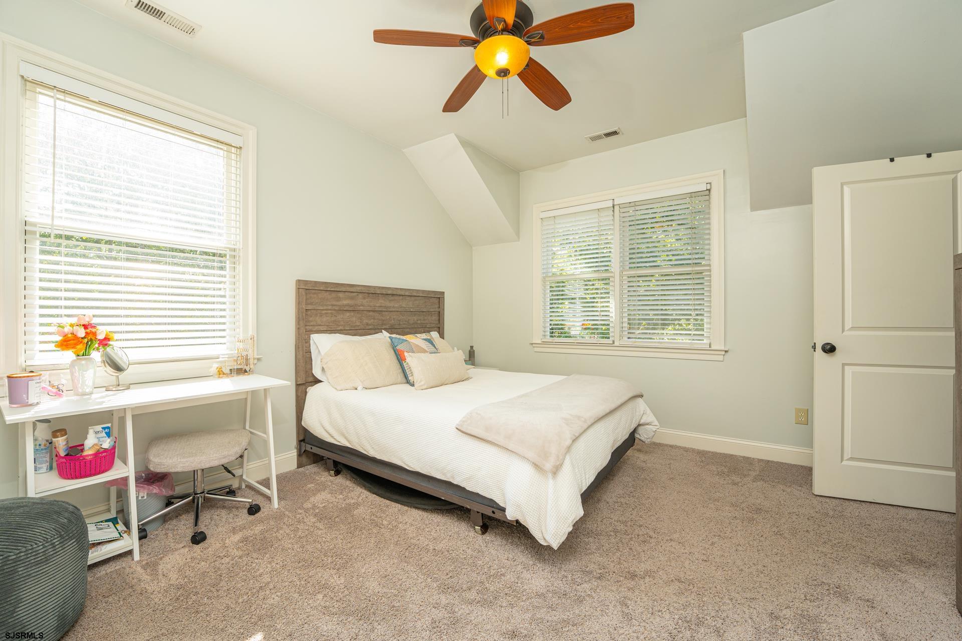 103 Tyler Road Ocean View, NJ 08230 - Photo 68 of 80 a bedroom with a bed and a window