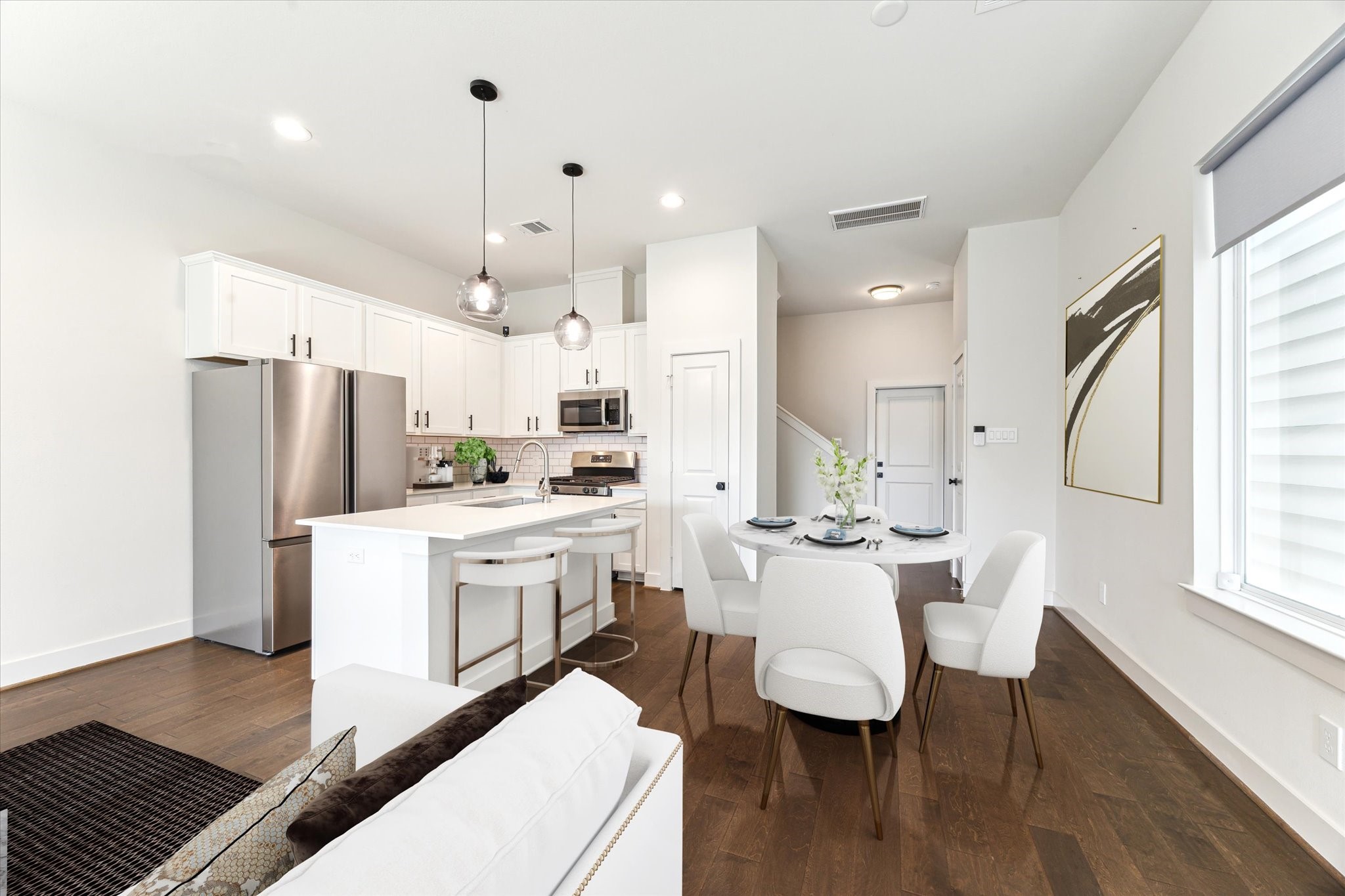 4155 Griggs Road Houston, TX 77021 - Photo 2 of 17 Virtually staged with of kitchen opening up to dining room.