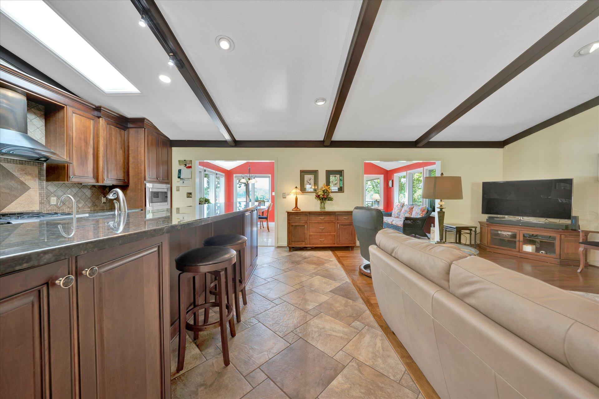 85 Chickadee Circle Moneta, VA 24121 - Photo 15 of 57 a living room with stainless steel appliances furniture and a flat screen tv