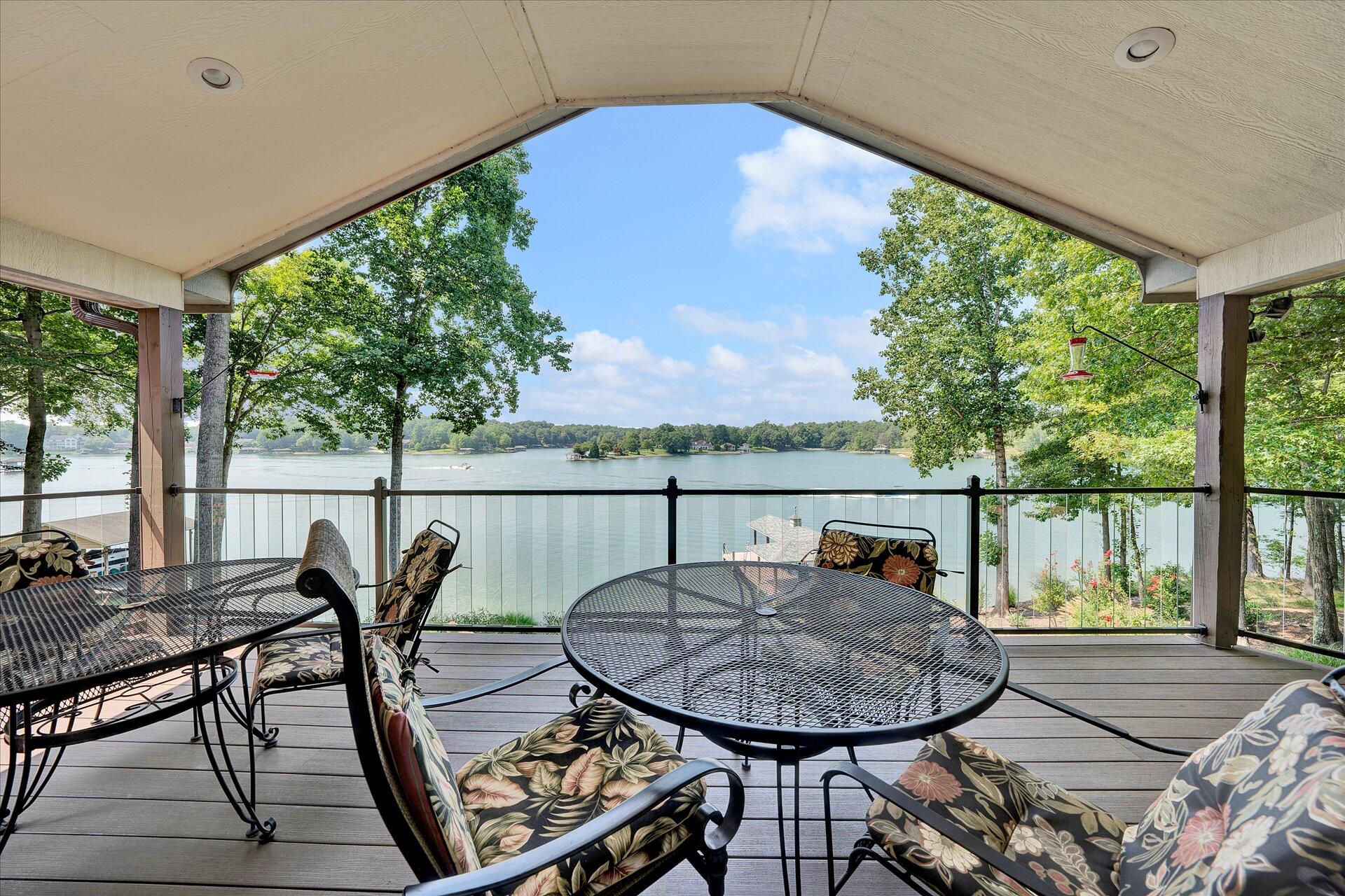 85 Chickadee Circle Moneta, VA 24121 - Photo 23 of 57 a balcony with table and chairs