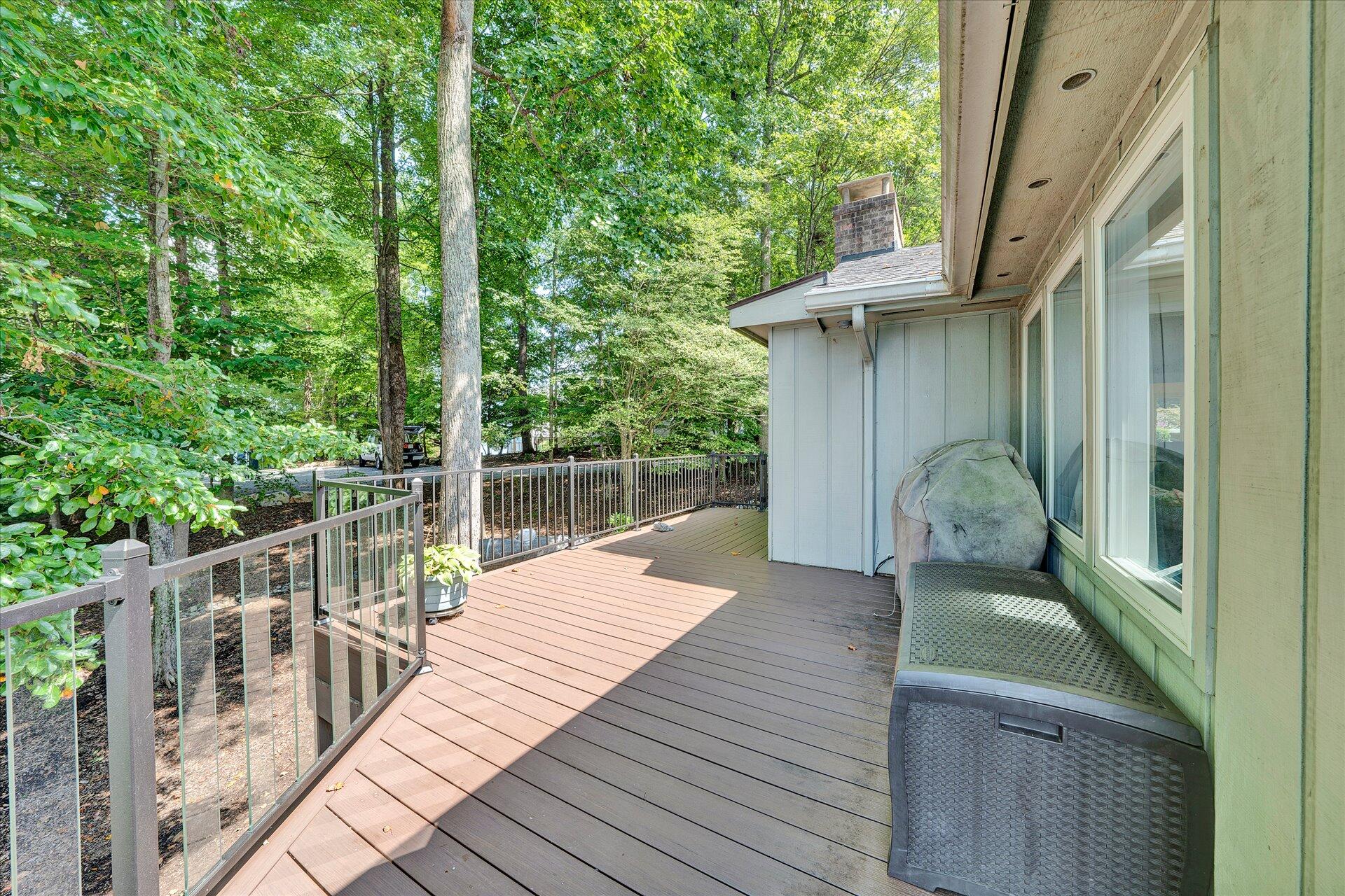 85 Chickadee Circle Moneta, VA 24121 - Photo 24 of 57 a view of balcony with wooden floor and outdoor seating