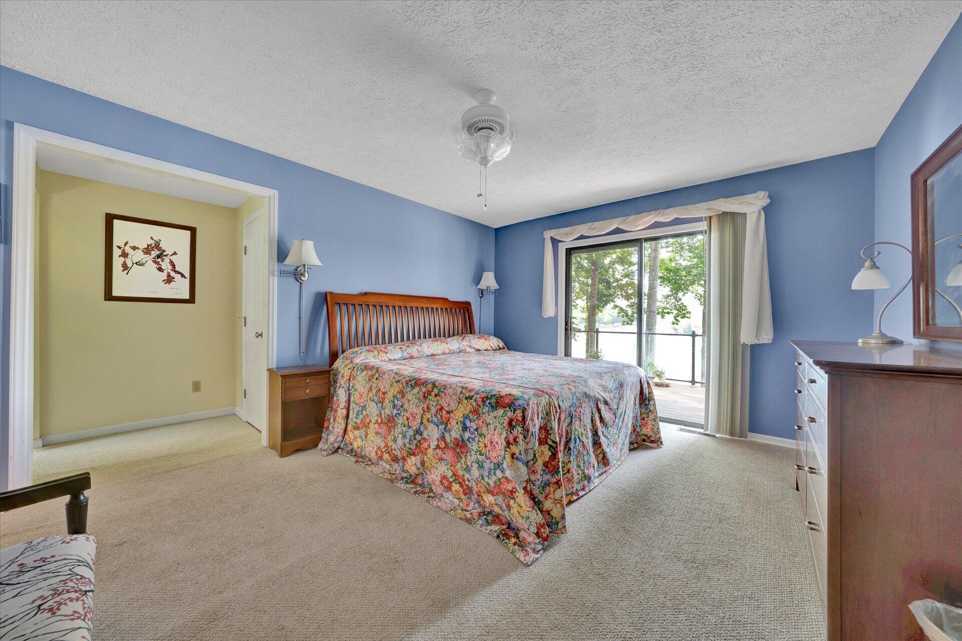 85 Chickadee Circle Moneta, VA 24121 - Photo 30 of 57 a bedroom with a large bed and a window