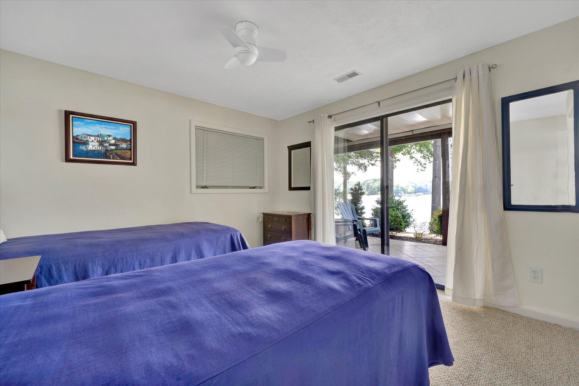 85 Chickadee Circle Moneta, VA 24121 - Photo 41 of 57 a bed sitting in a spacious bedroom next to a window