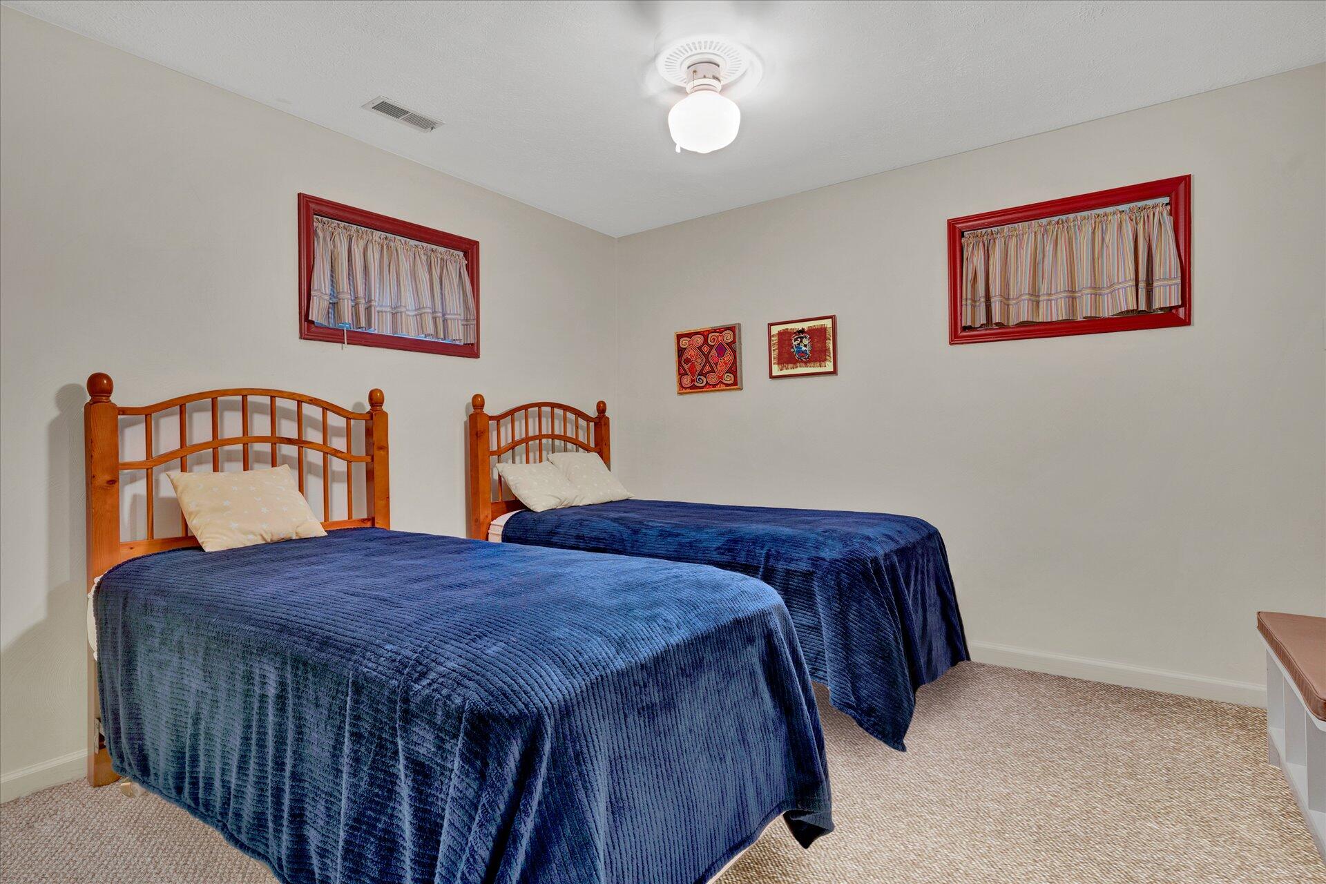 85 Chickadee Circle Moneta, VA 24121 - Photo 43 of 57 a bedroom with a bed and a dresser in it