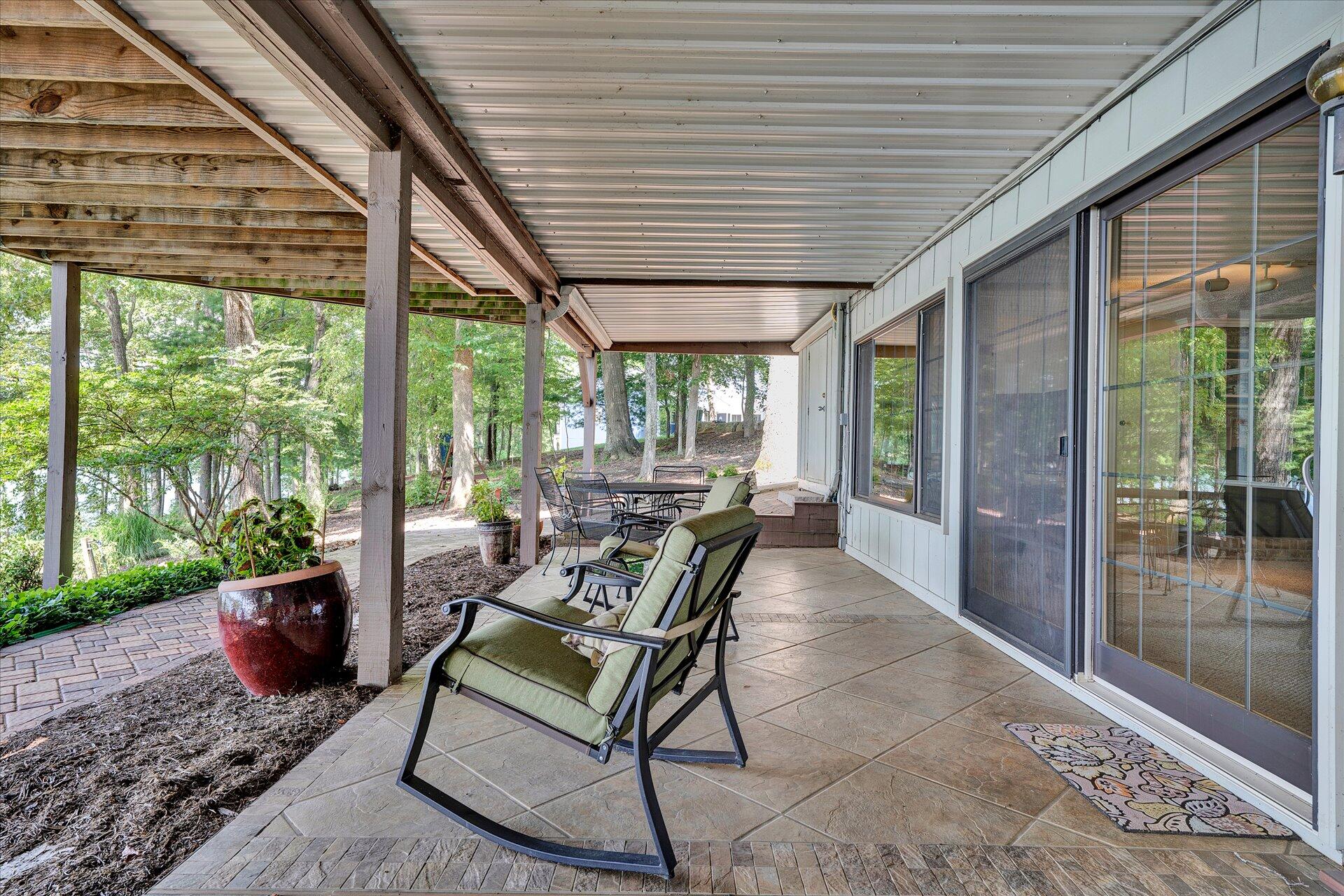 85 Chickadee Circle Moneta, VA 24121 - Photo 45 of 57 a building outdoor space with furniture and garden