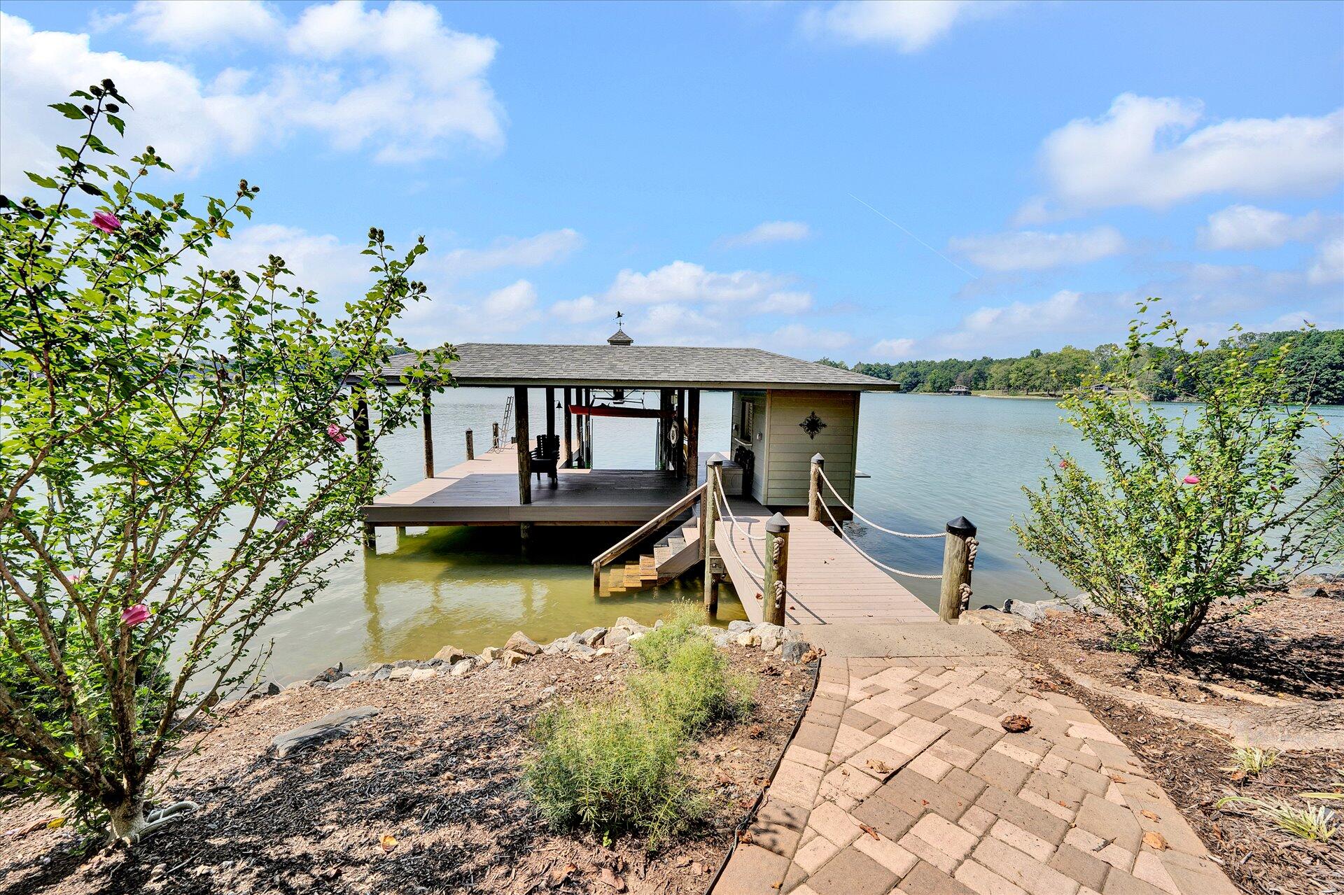 85 Chickadee Circle Moneta, VA 24121 - Photo 48 of 57 a view of a house with pool and sitting area