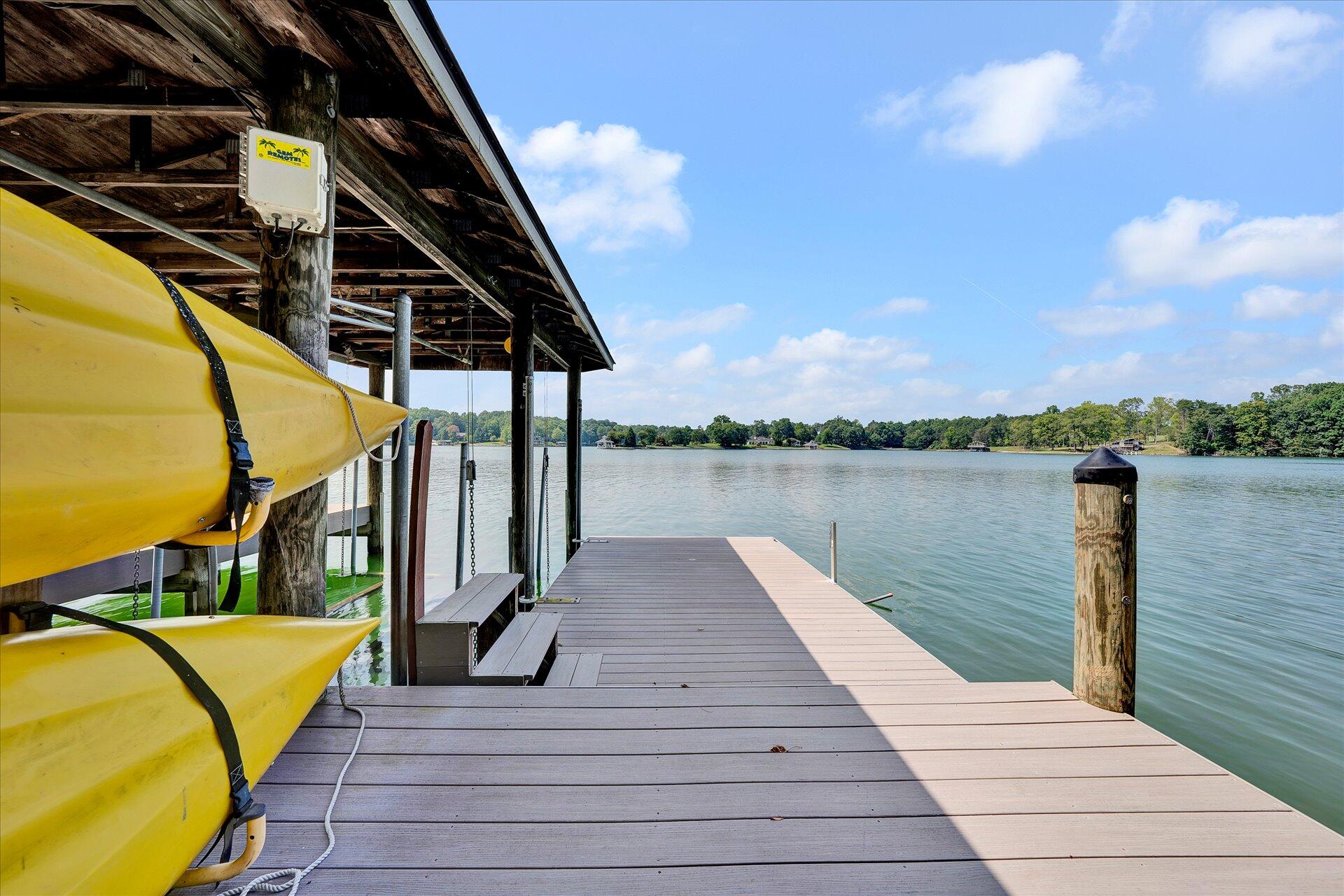 85 Chickadee Circle Moneta, VA 24121 - Photo 50 of 57 a view of a lake with sitting area