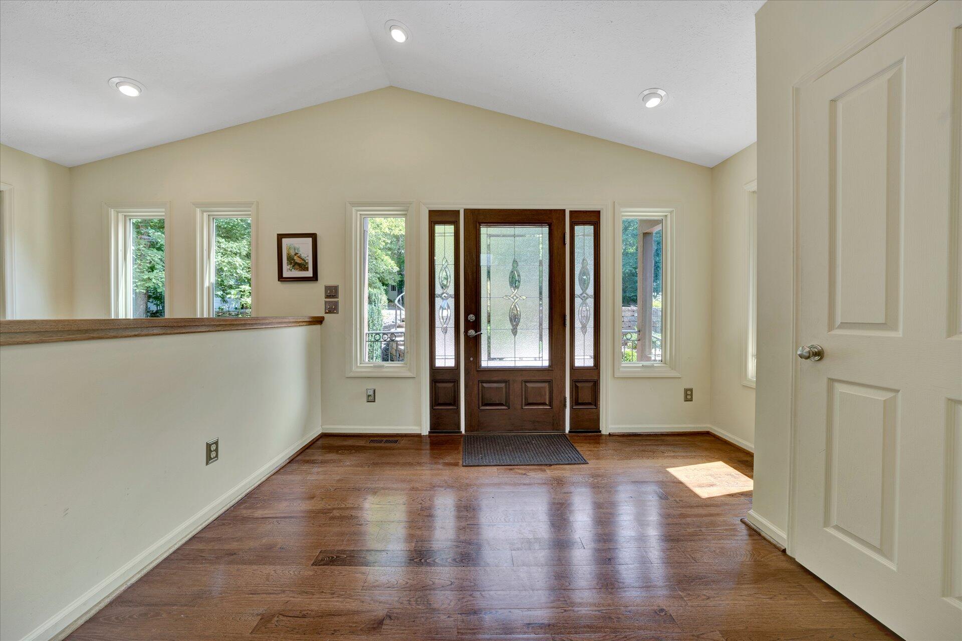 85 Chickadee Circle Moneta, VA 24121 - Photo 6 of 57 wooden floor in an empty room with a window