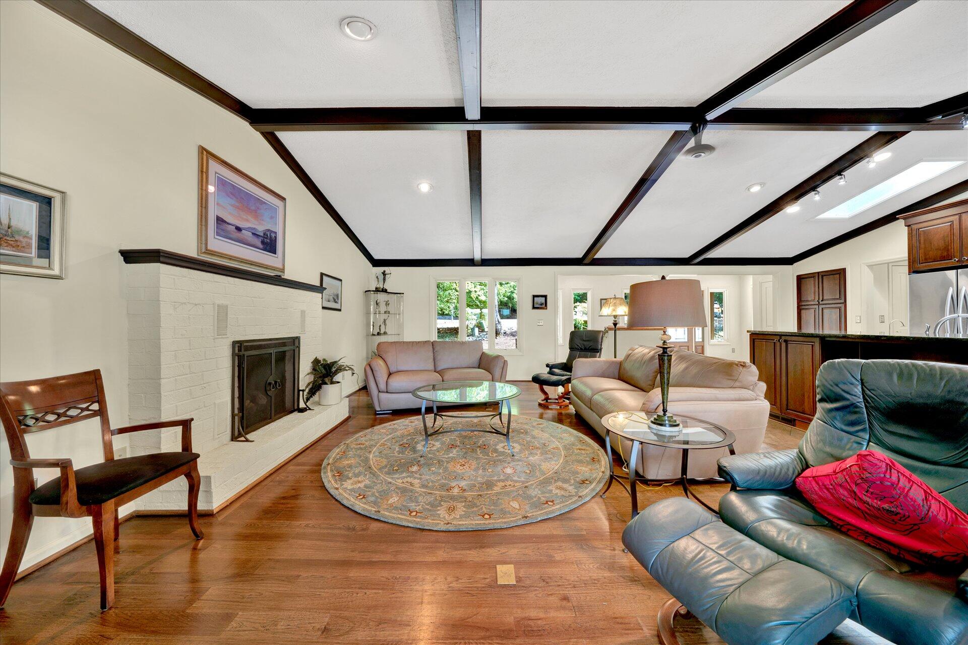 85 Chickadee Circle Moneta, VA 24121 - Photo 9 of 57 a living room with furniture and a fireplace