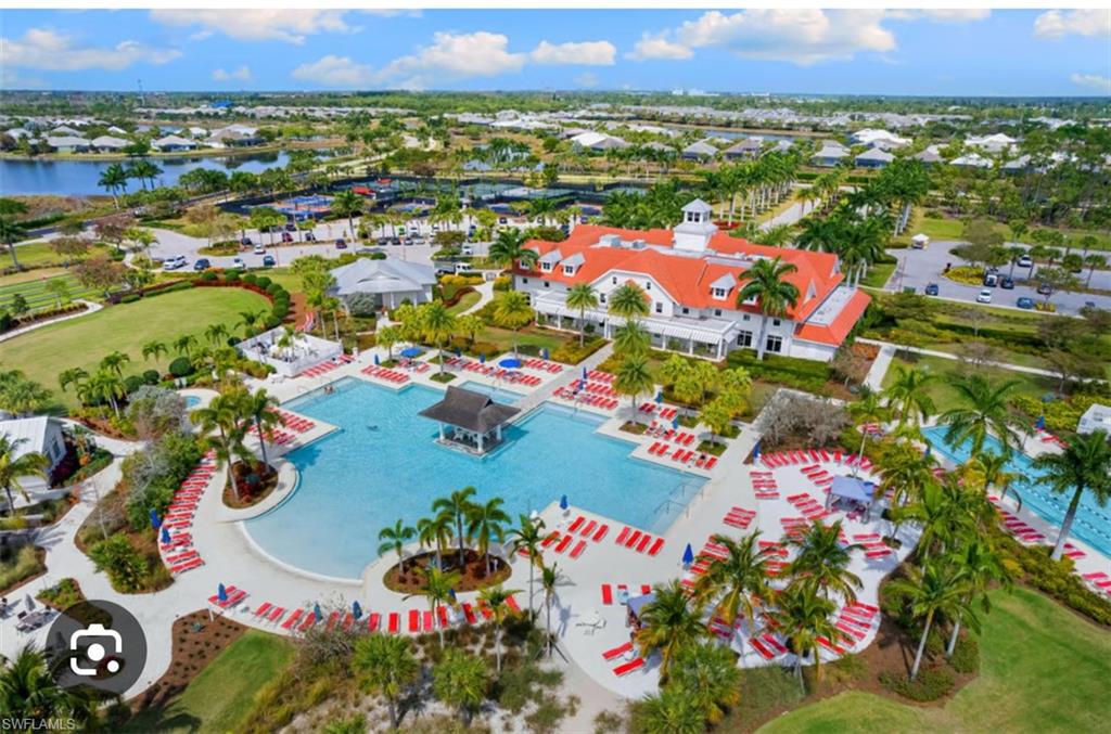 7289 Saona Court Naples, FL 34113 - Photo 15 of 17 an aerial view of a city