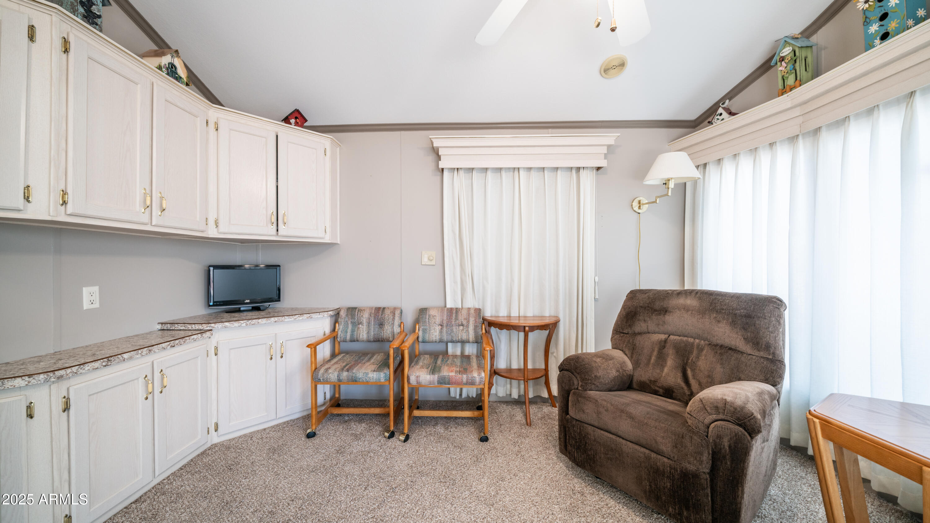 3 Ore Cart Drive, Unit 3 Apache Junction, AZ 85119 - Photo 11 of 59 a livingroom with workspace and a couch