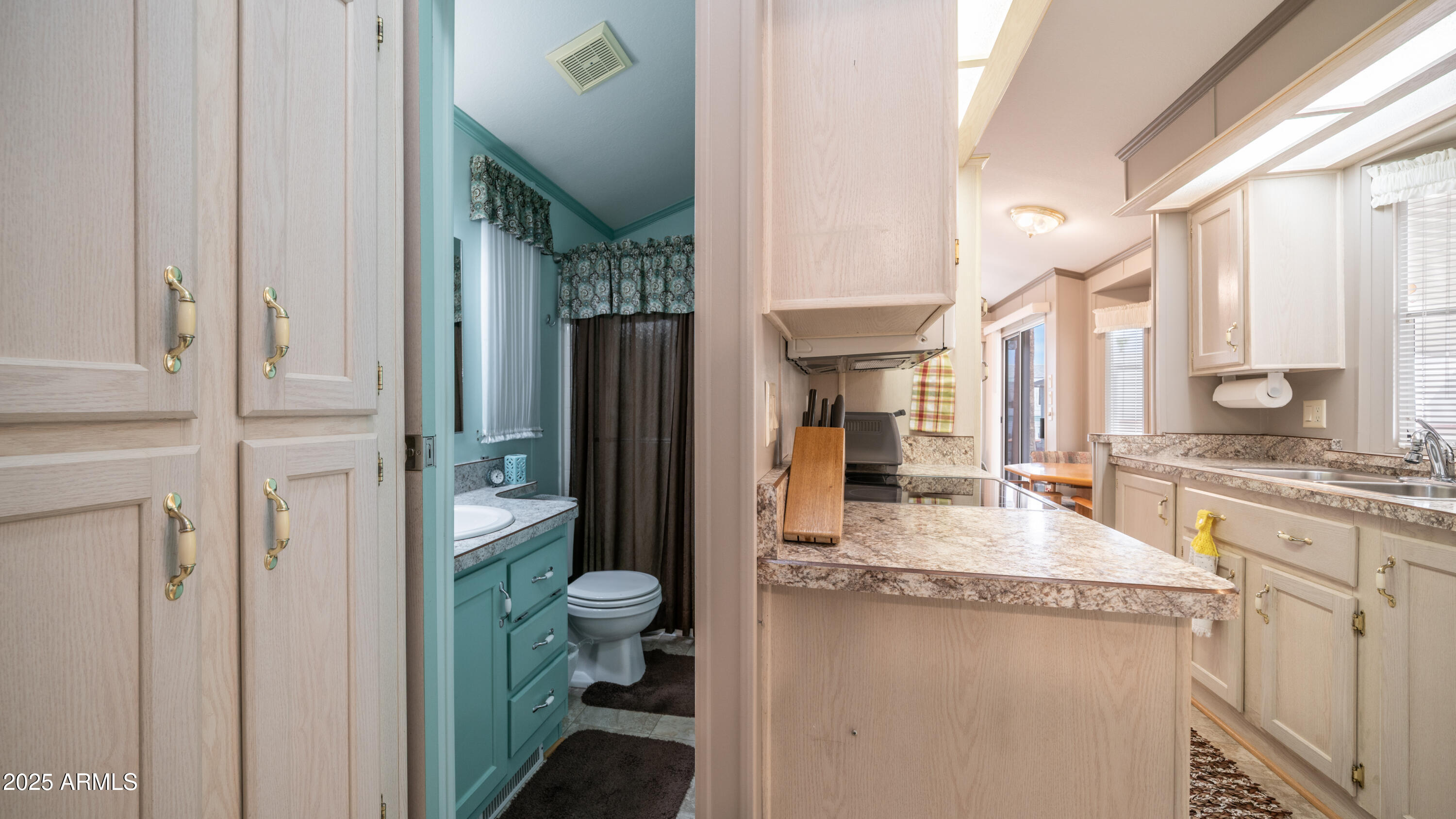 3 Ore Cart Drive, Unit 3 Apache Junction, AZ 85119 - Photo 20 of 59 a bathroom with a granite countertop sink and a mirror