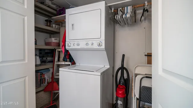 a view of a balcony with chairs