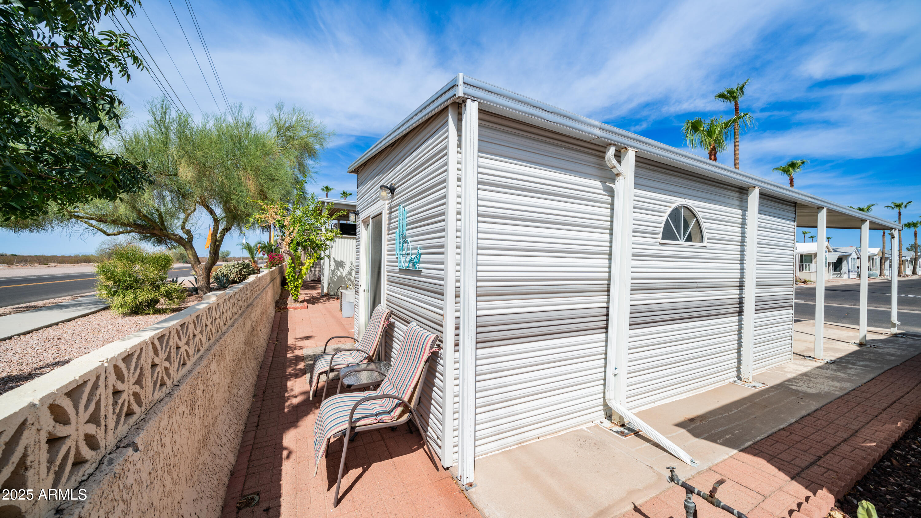 3 Ore Cart Drive, Unit 3 Apache Junction, AZ 85119 - Photo 28 of 59 a view of a balcony with chairs