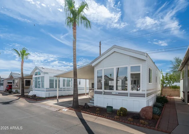 a view of living room kitchen and utility room