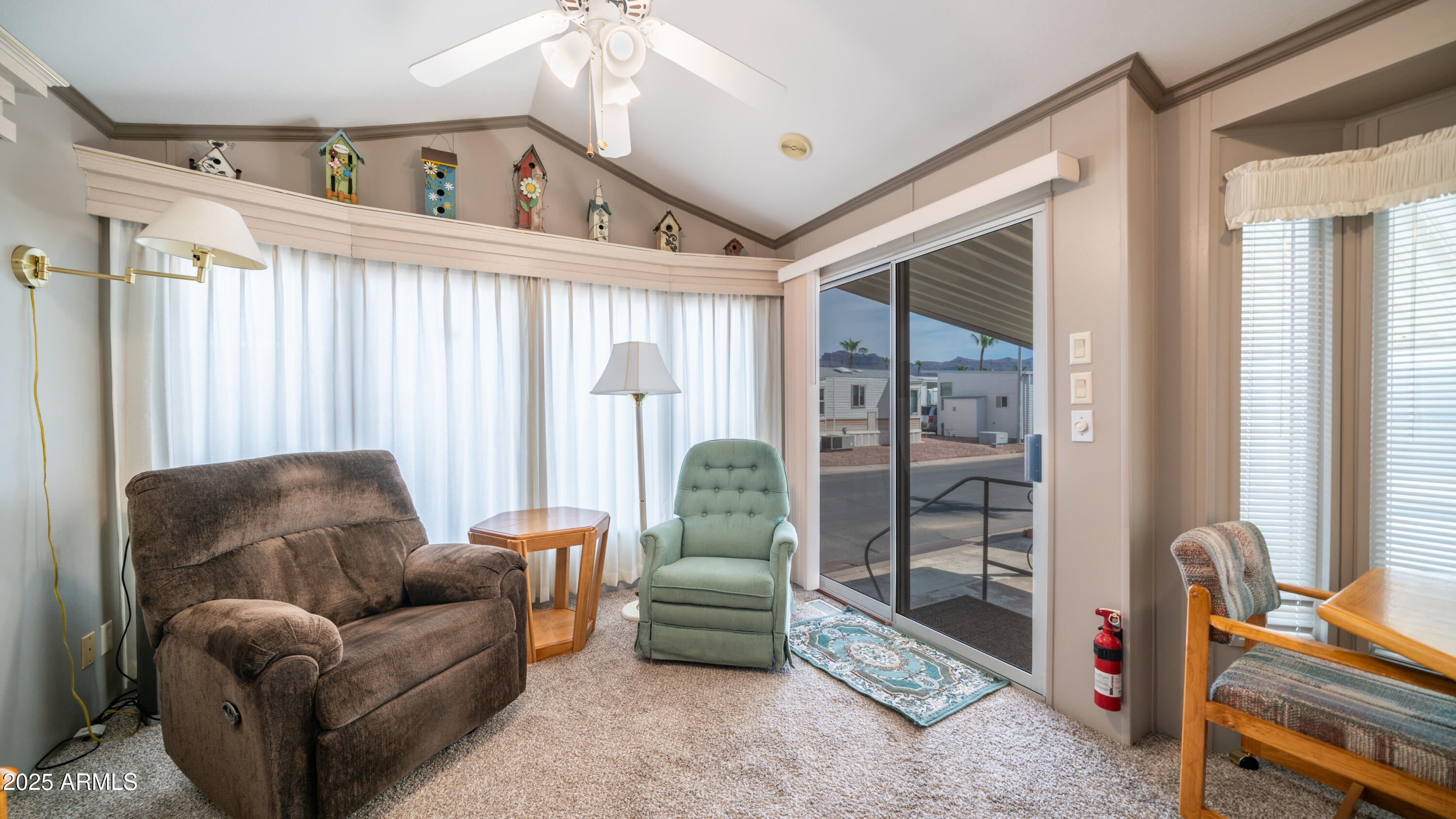 3 Ore Cart Drive, Unit 3 Apache Junction, AZ 85119 - Photo 8 of 59 a living room with furniture and a flat screen tv