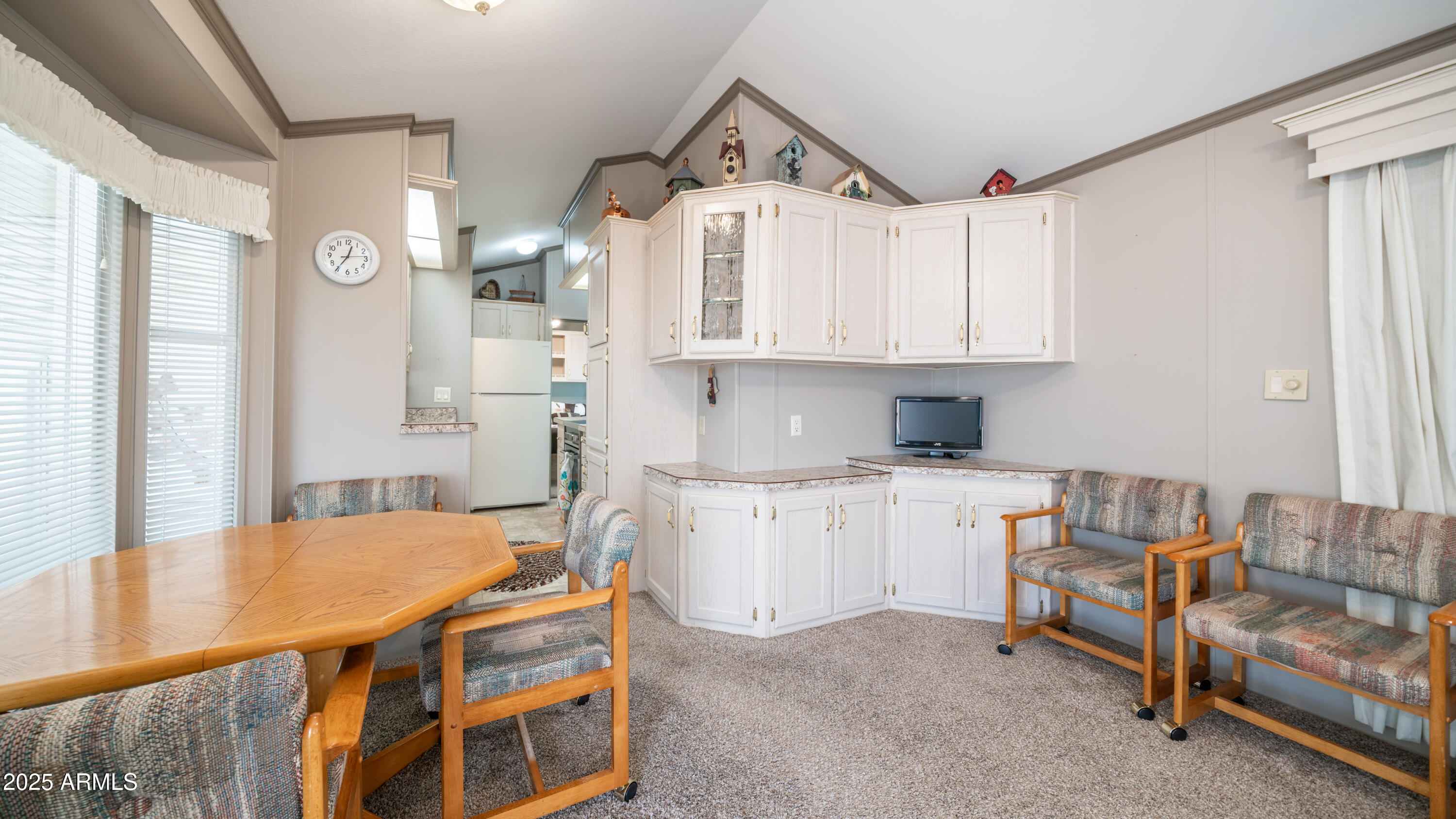 3 Ore Cart Drive, Unit 3 Apache Junction, AZ 85119 - Photo 10 of 59 a kitchen with stainless steel appliances granite countertop a stove a sink and a refrigerator