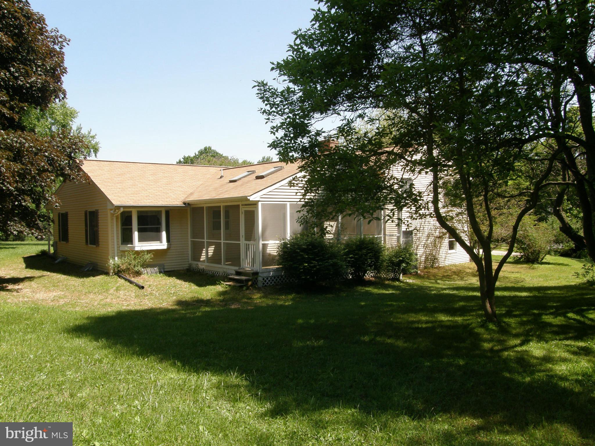 5603 Sweet Air Road Baldwin, MD 21013 - Photo 12 of 30 a front view of a house with a garden