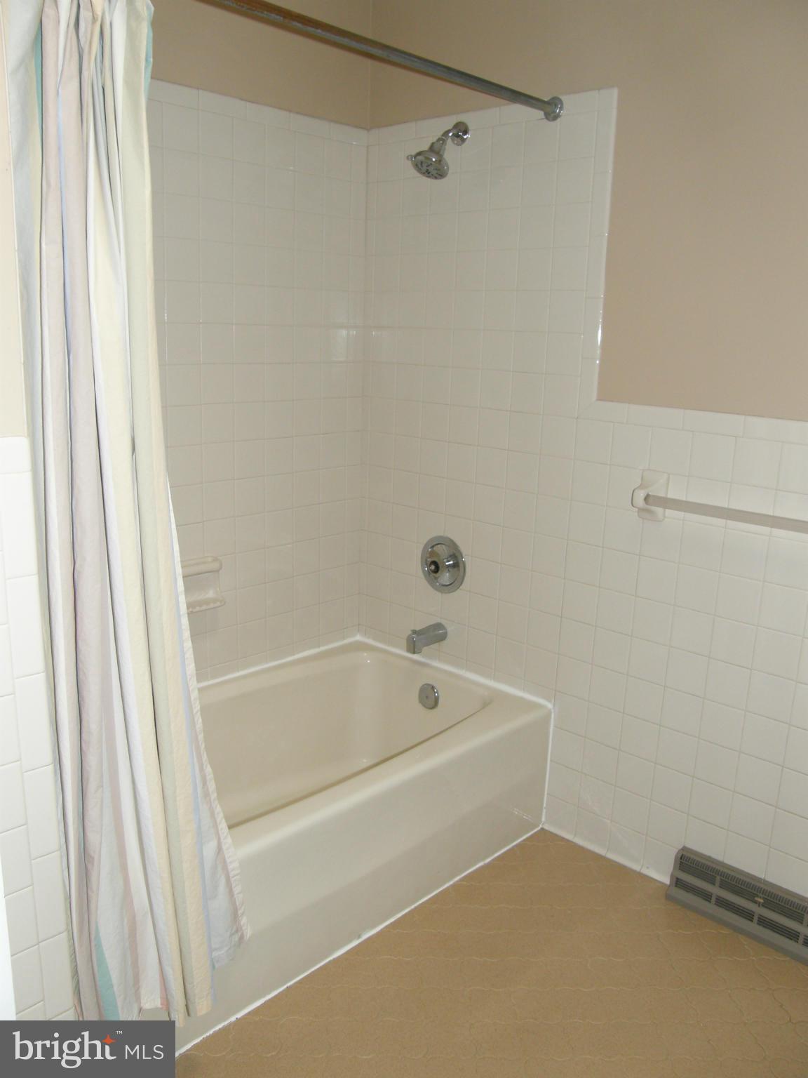 5603 Sweet Air Road Baldwin, MD 21013 - Photo 18 of 30 a bathroom with a tub and shower