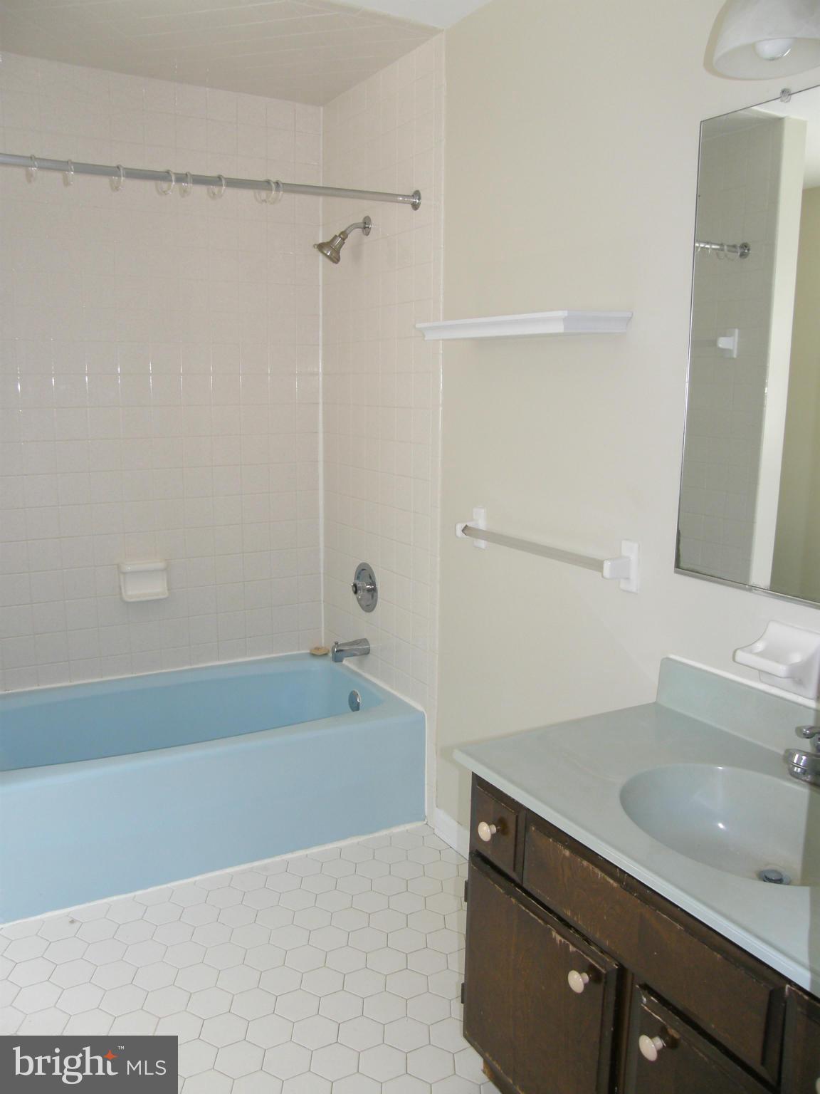 5603 Sweet Air Road Baldwin, MD 21013 - Photo 29 of 30 a bathroom with a bathtub and a sink