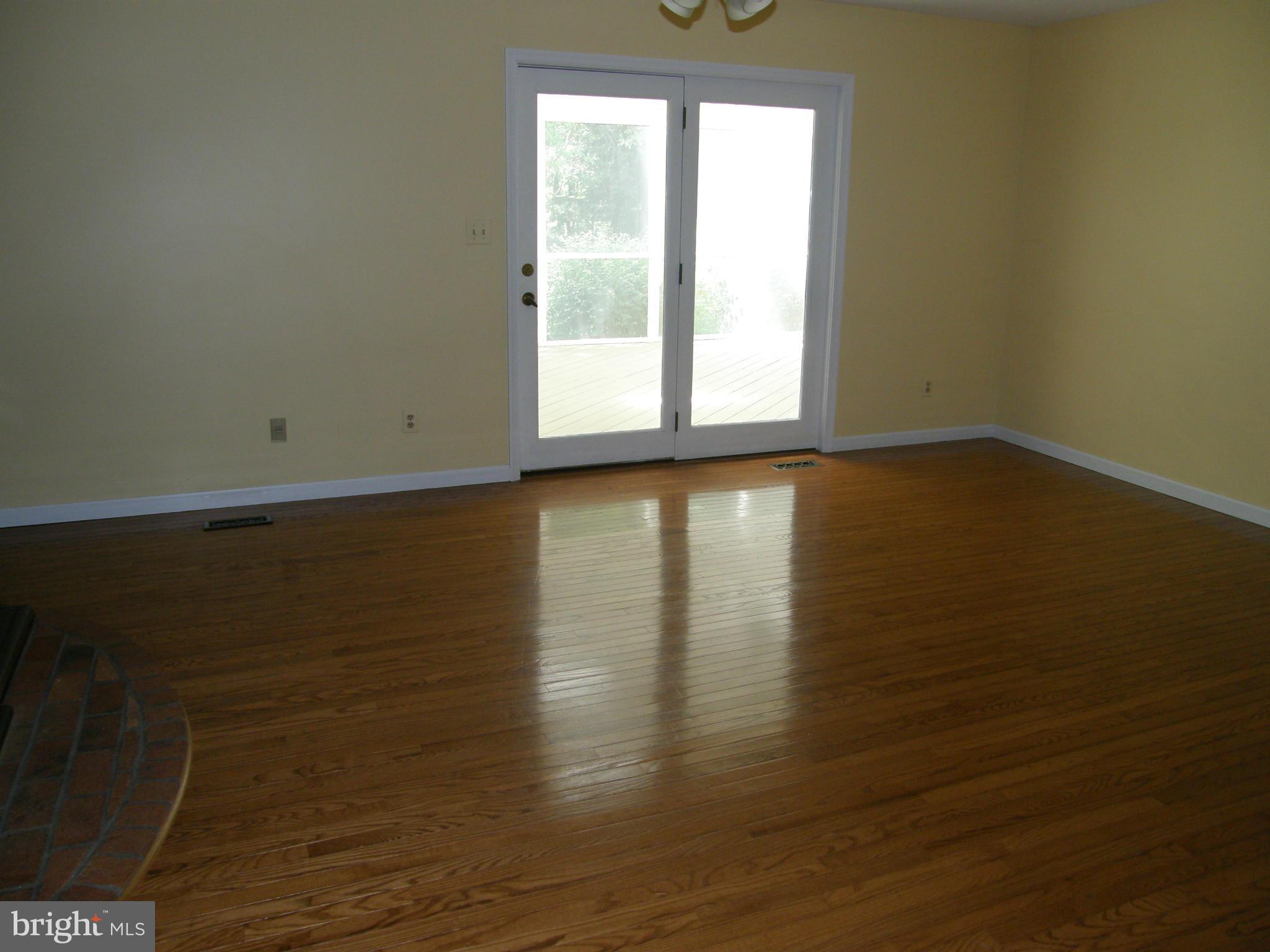 5603 Sweet Air Road Baldwin, MD 21013 - Photo 9 of 30 a view of a room with wooden floor and a window