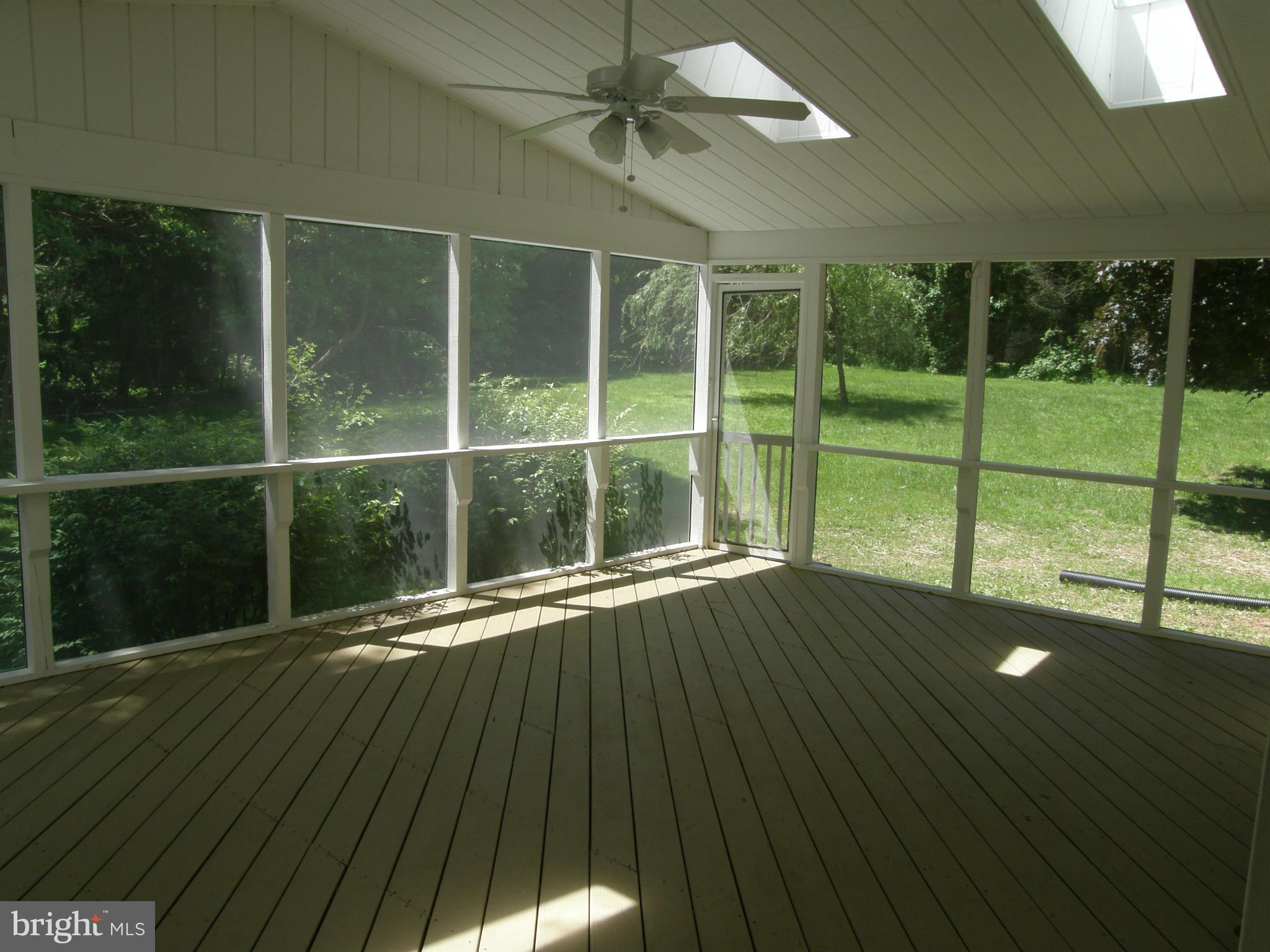 5603 Sweet Air Road Baldwin, MD 21013 - Photo 10 of 30 a view of an empty room with wooden floor and a window